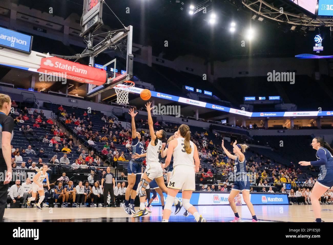 Minneapolis, Minnesota, USA. 2nd Mar, 2023. Michigan Wolverines guard LAILA PHELIA (5) and Penn State Nittany Lions guard LEILANI KAPINUS (5) fight for the ball on a rebound during the first half of Penn State versus Michigan on Thursday March 2 at the 2023 Big Ten Women's Basketball Tournament in Minneapolis, Minnesota. Michigan won 63-61. (Credit Image: © Steven Garcia/ZUMA Press Wire) EDITORIAL USAGE ONLY! Not for Commercial USAGE! Stock Photo