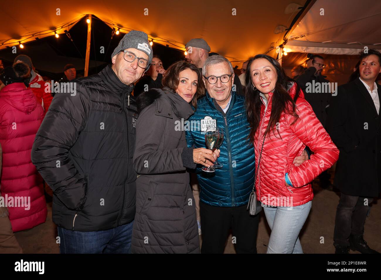 Heringsdorf, Germany. 03rd Mar, 2023. Wolfram Becker (l-r), Gerit Kling, Jan Hofer and Phong Lan Hofer arrive at the pre-reception of the 'Baltic Lights' sled dog race at Strandbar Alex. Credit: Gerald Matzka/dpa/Alamy Live News Stock Photo