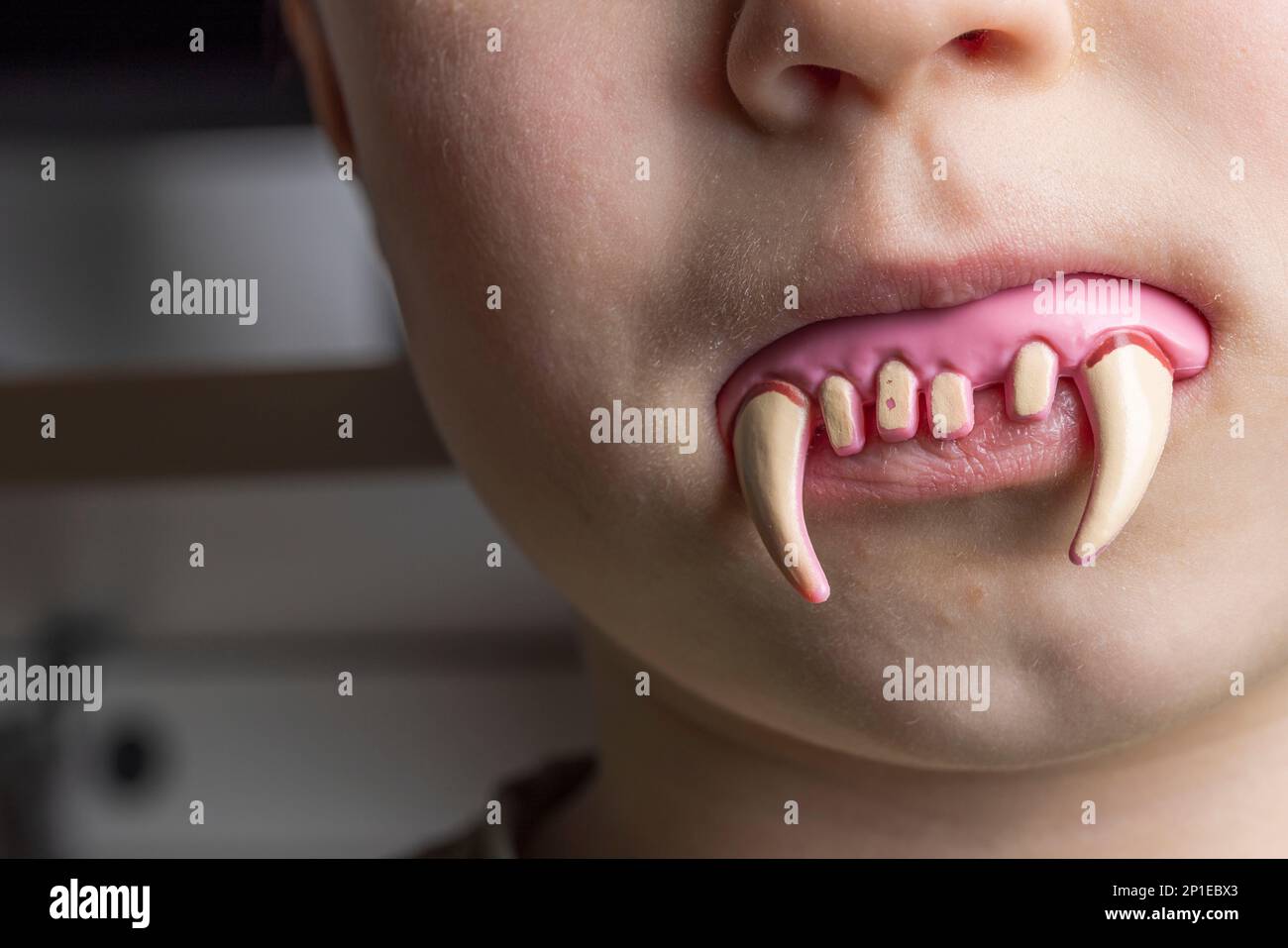 Boy vampire teeth hi-res stock photography and images - Alamy