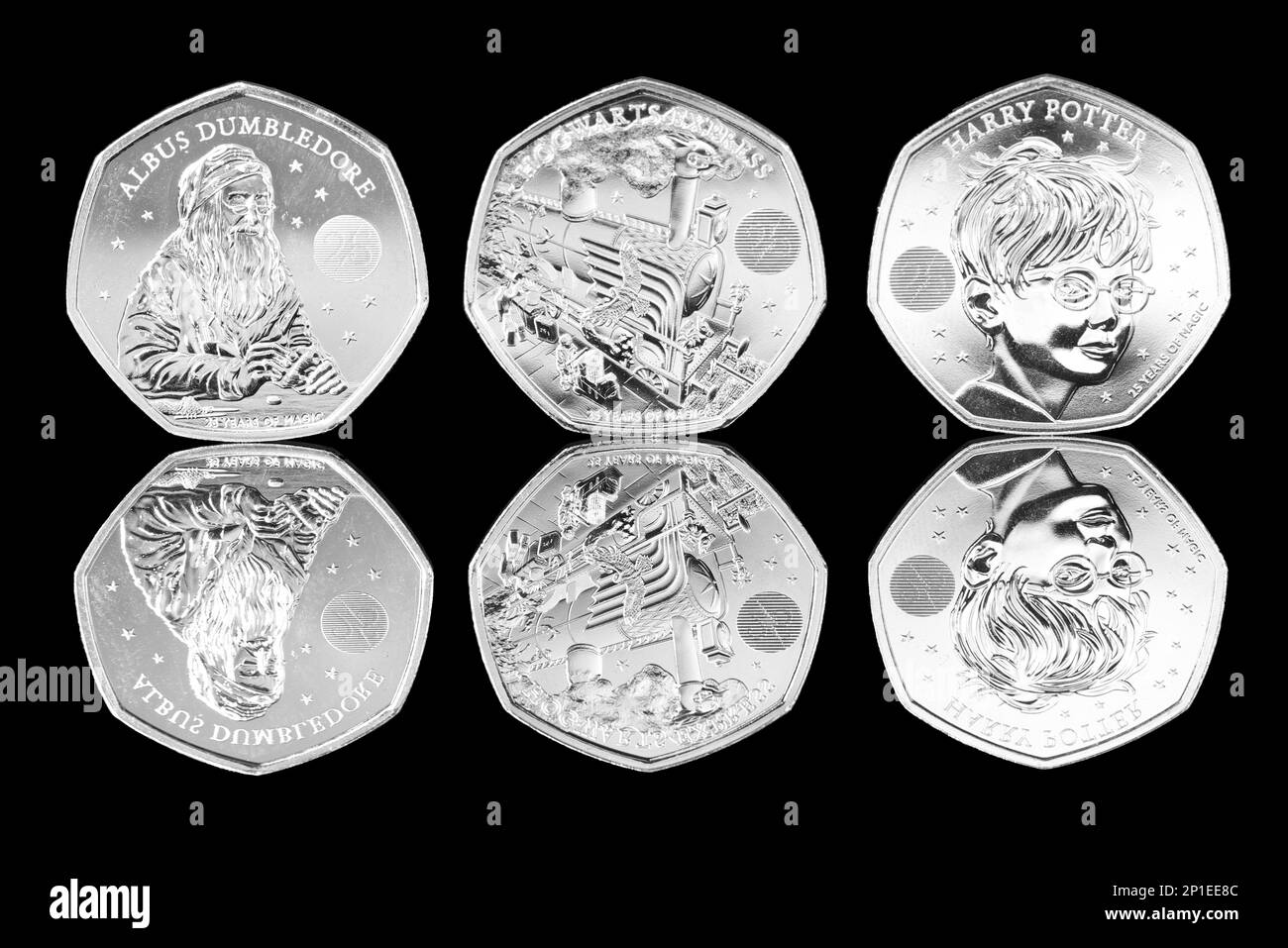 Three 50p coins to commemorate 25 years of Harry Potter. The coins feature Albus Dumbledore, Hogwarts Express & Harry Potter Stock Photo