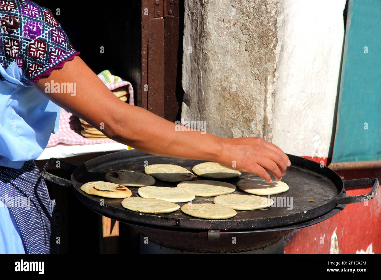 https://c8.alamy.com/comp/2P1EX2M/view-of-female-indigenous-hand-making-tortillas-on-comal-traditional-food-2P1EX2M.jpg