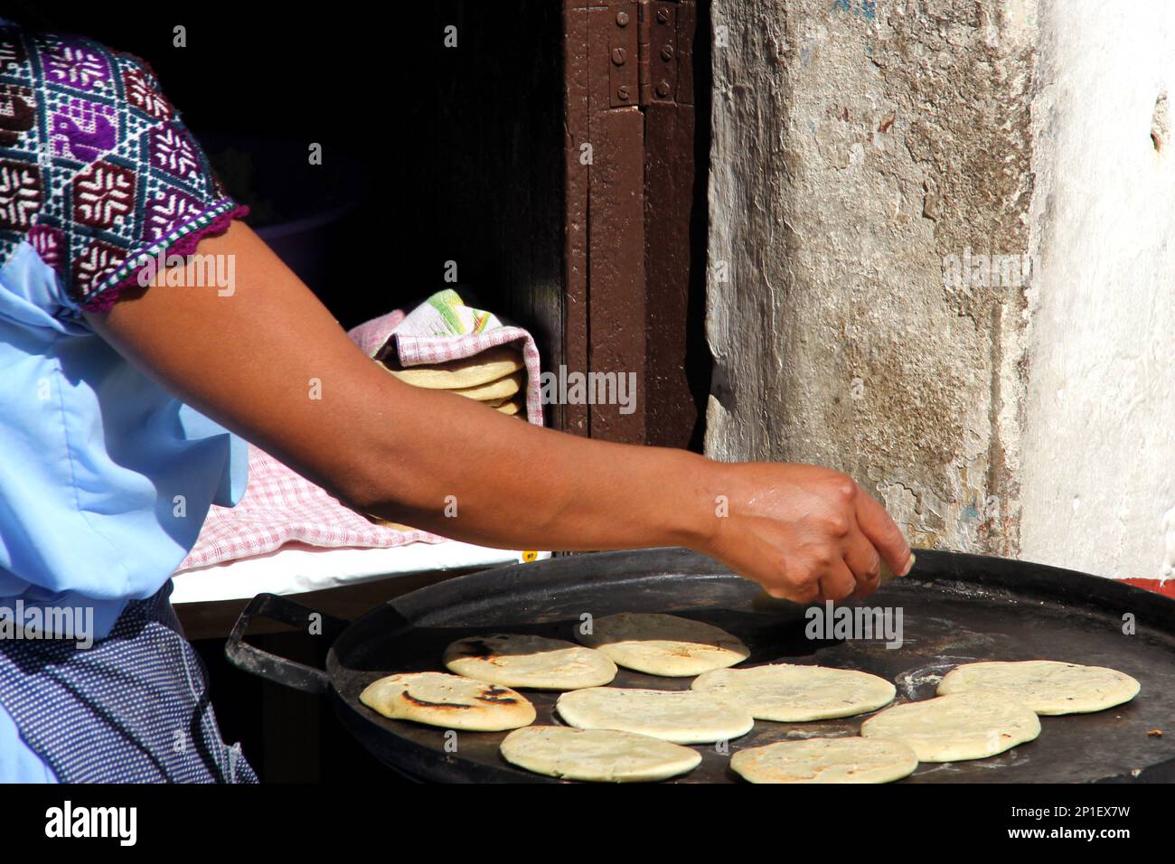 https://c8.alamy.com/comp/2P1EX7W/view-of-female-indigenous-hand-making-tortillas-on-comal-traditional-food-2P1EX7W.jpg