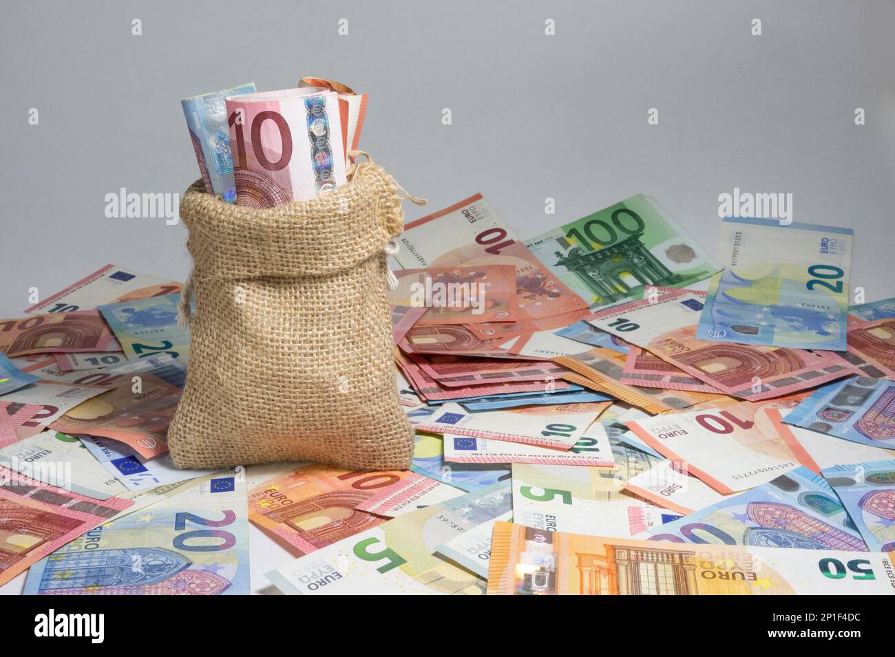 bag full of money. scattered banknotes Stock Photo Alamy
