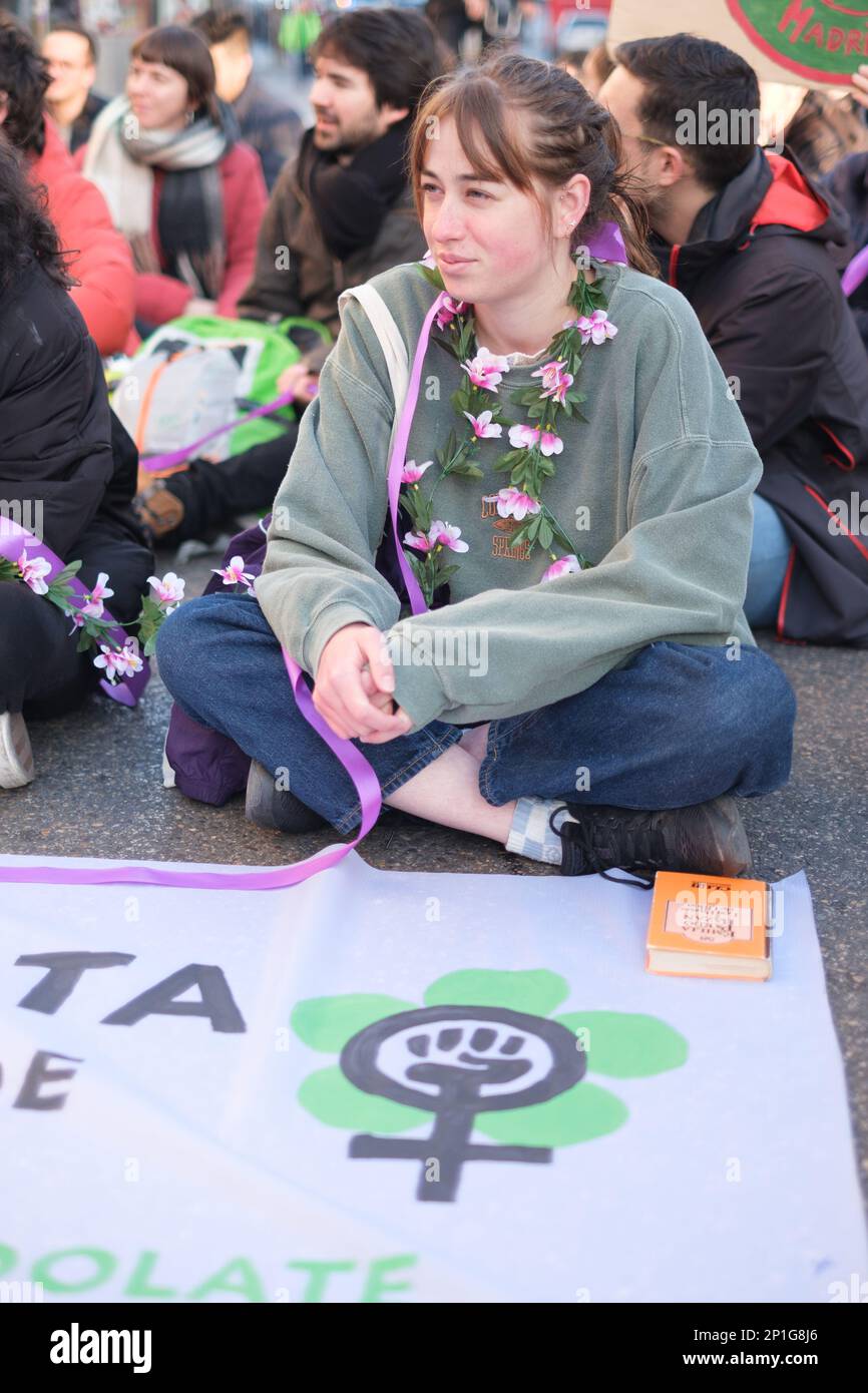 Protesters sit on the road during a demonstration of the 'Youth for Climate' movement, in front of the Congress of Deputies in Madrid. The youth movement has called for an international protest to demand the climate justice, highlighting the situation of vulnerability and inequality that women face in the context of the climate crisis. The collective wants to take advantage of the proximity of the International Day of Working Women, on March 8, to give visibility to the different currents that establish a connection between violence exerted on nature and women. (Photo by Atilano Garcia/SOPA Stock Photo