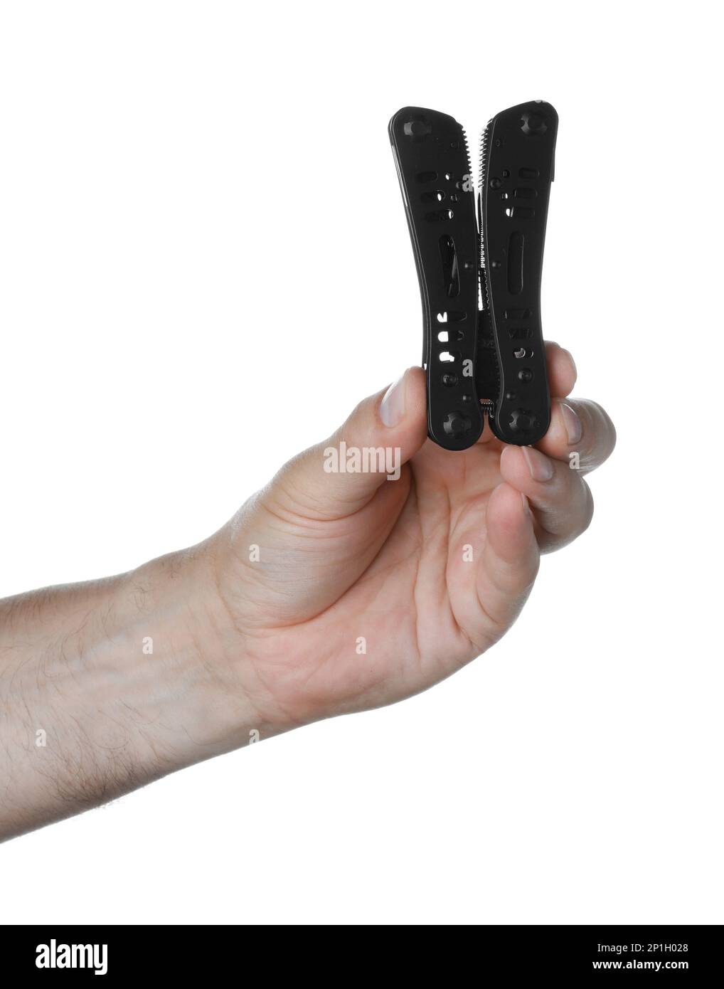 Man holding multitool on white background, closeup Stock Photo