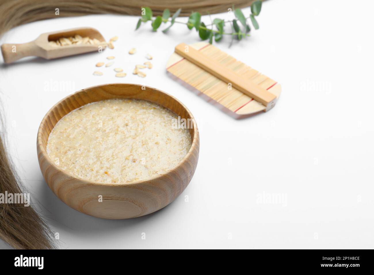 Homemade hair mask, oatmeal and comb on white background, space for text Stock Photo Alamy