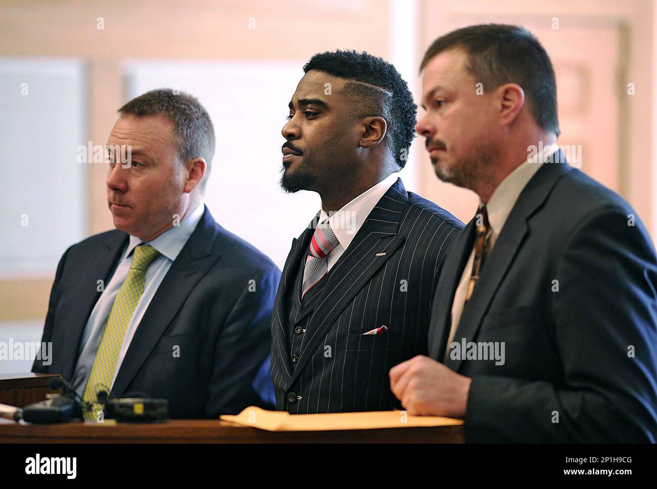 Former Ohio State University quarterback Troy Smith, center, pleaded