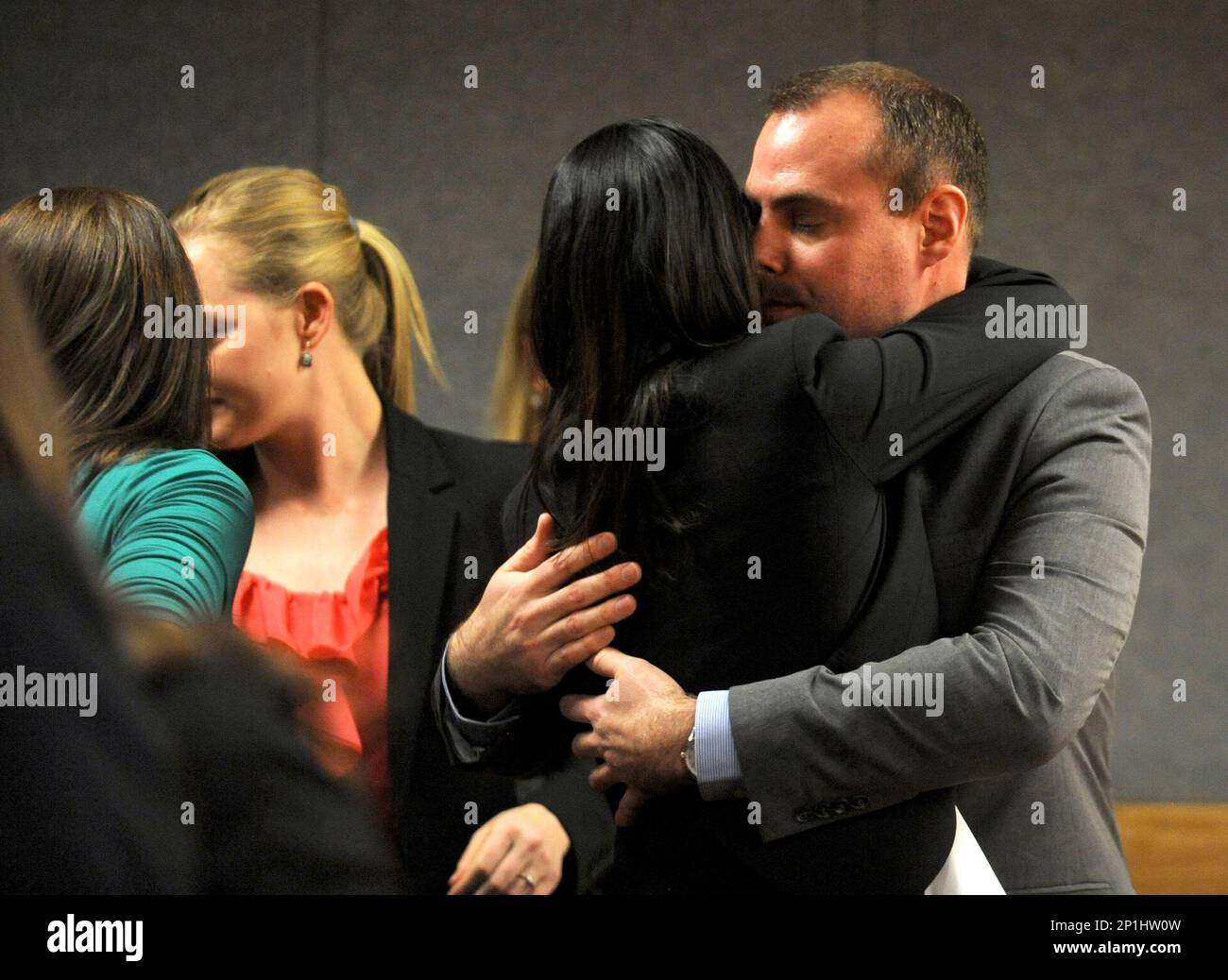 Tom Fallis hugs his attorney Iris Eytan after being found not guilty at