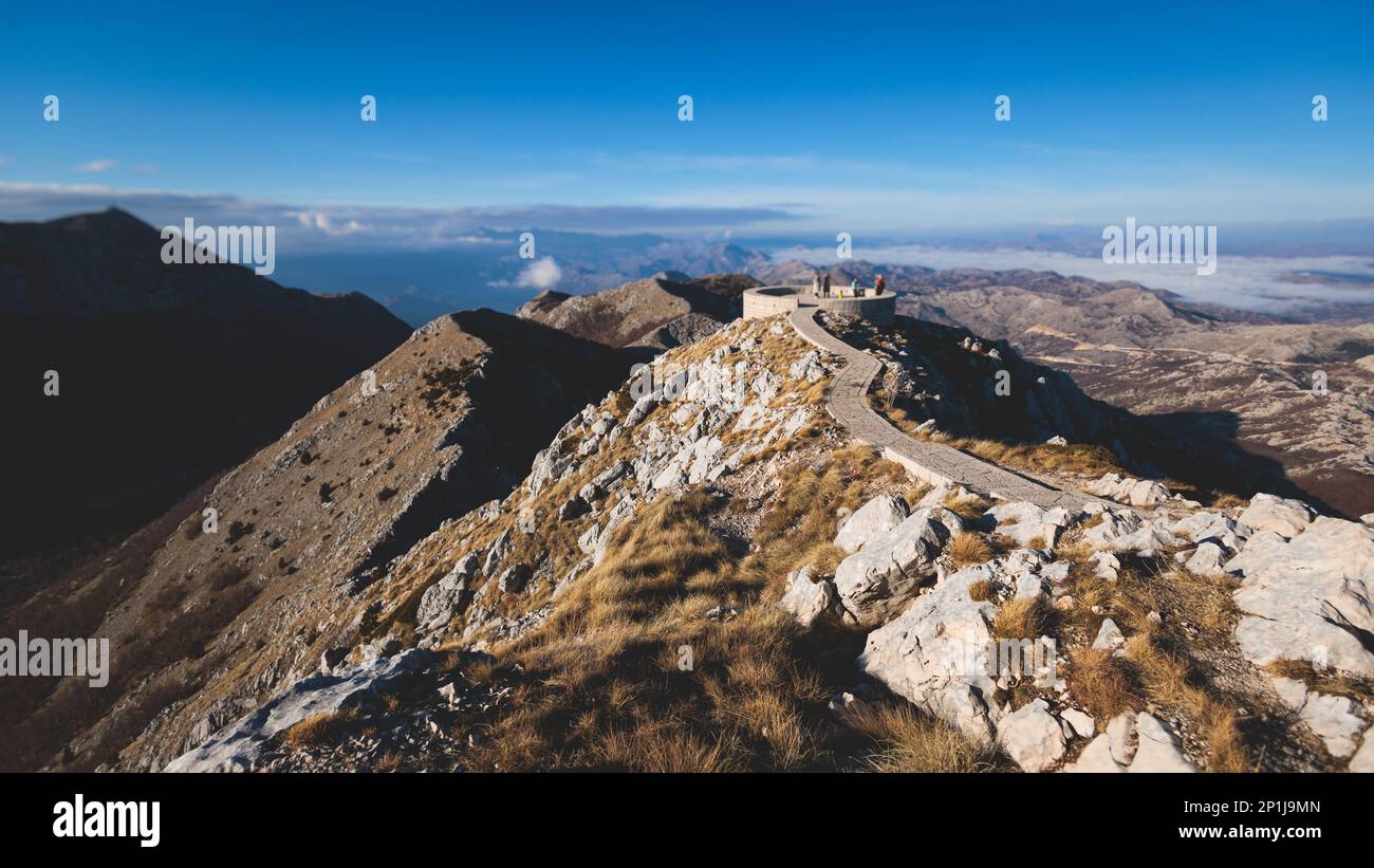 Beautiful aerial view of Lovcen National Park panorama, seen from mount Lovcen, Njegos mausoleum observation deck, Montenegro in sunny day, with blue Stock Photo