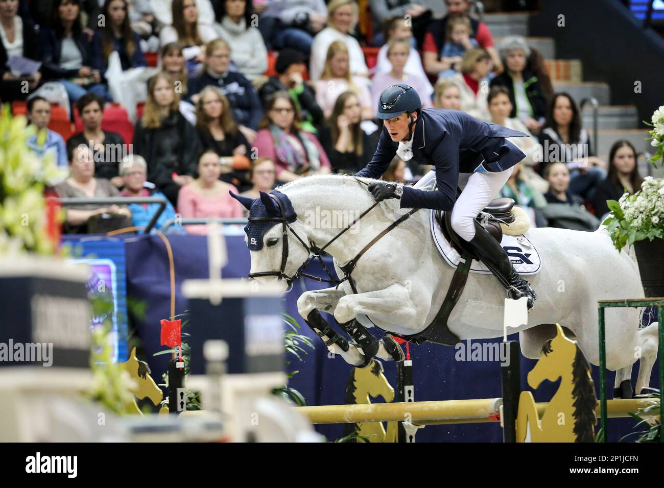 Daniel Deusser of Germany rides his horse d'Amour during the