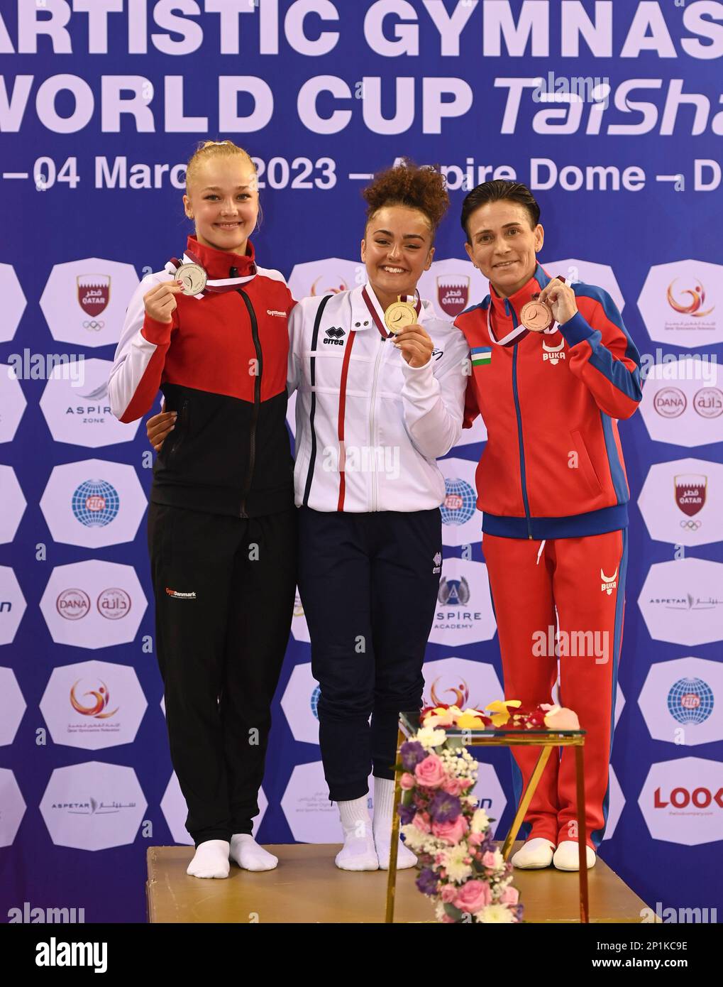 Doha, Qatar. 3rd Mar, 2023. Gold medalist Coline Devillard (C) of ...