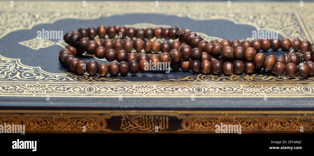 Islamic prayer beads or tasbih in an artistic. It is suitable for background of Ramadan-themed design concepts or other Islamic religious events Stock Photo