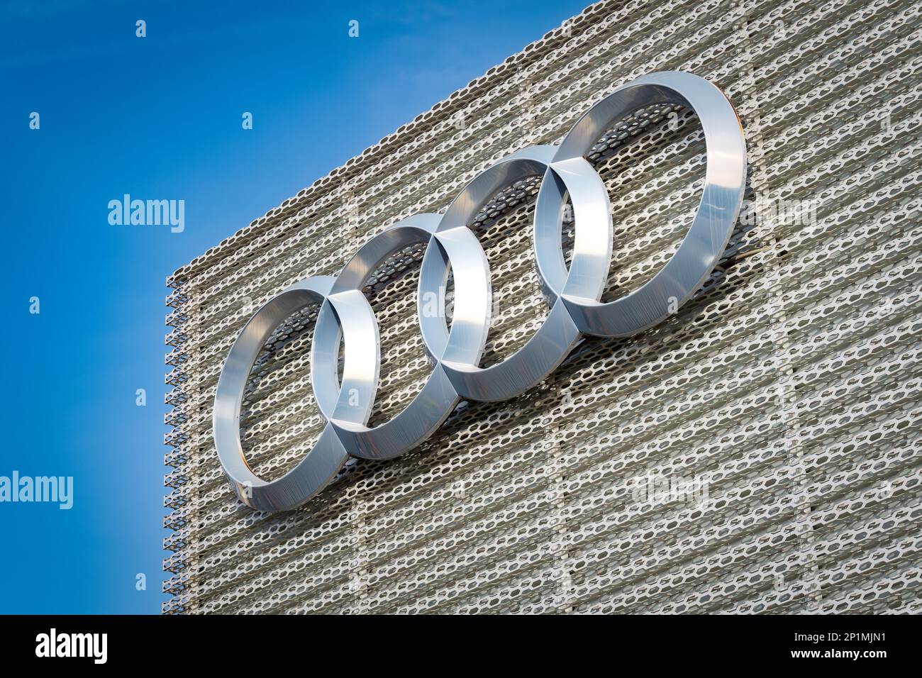Ontario, USA – February 17, 2023: Audi Union AG four-ring logo originally represented the four constituent brands of Audi, Horch, DKW and Wanderer. Stock Photo