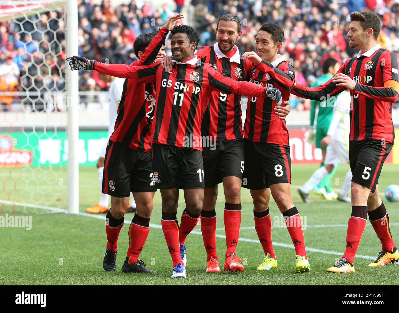 Dejan Damjanovic of South Korea's FC Seoul, left, shoots against