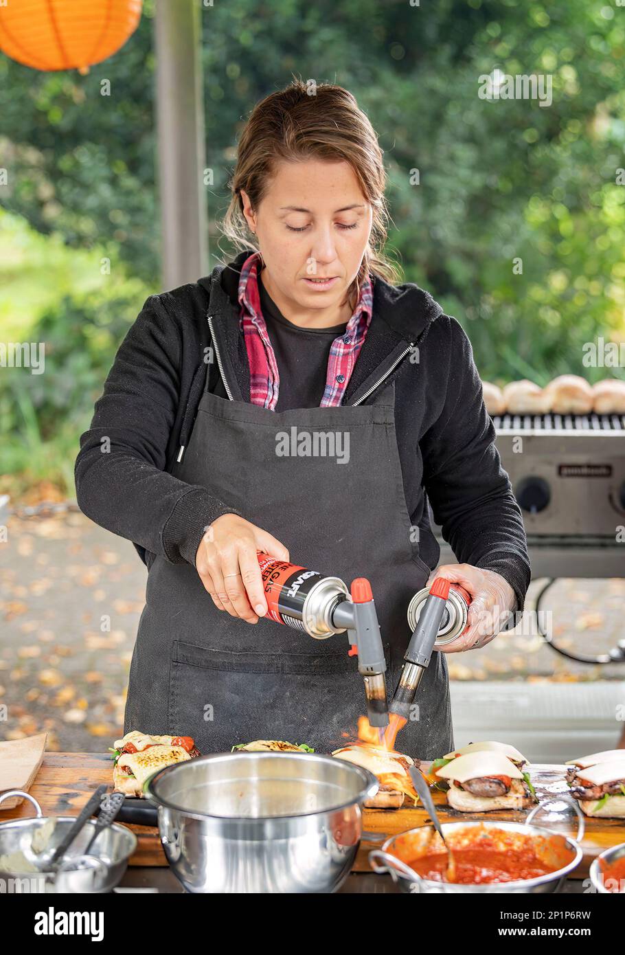 Christchurch, New Zealand. 4th Mar, 2023. A stall worker at the