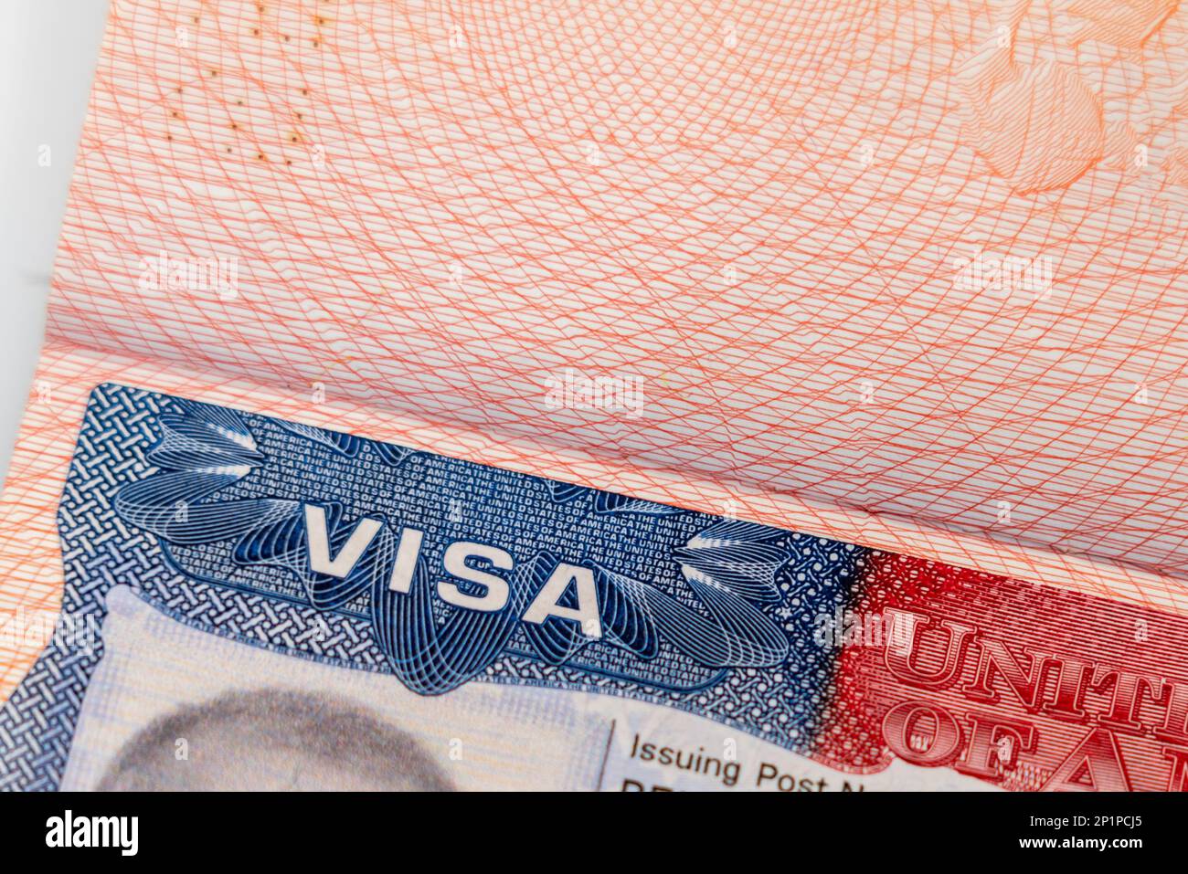 Close-up of a corner with an American visa stamp with a characteristic blue color Stock Photo