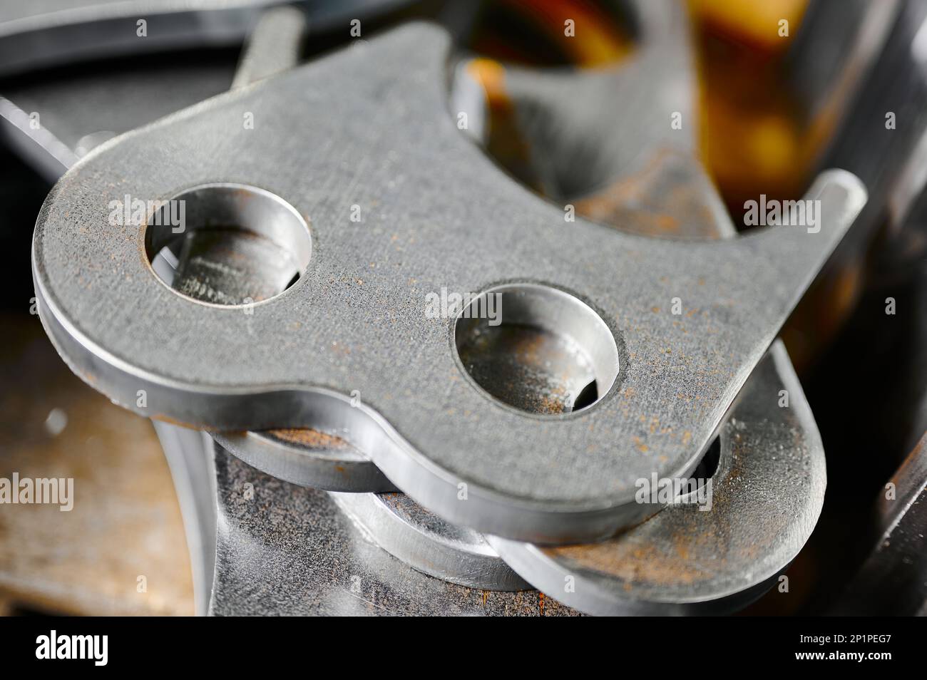 Steel elements with ground edges and corners in warehouse Stock Photo Alamy