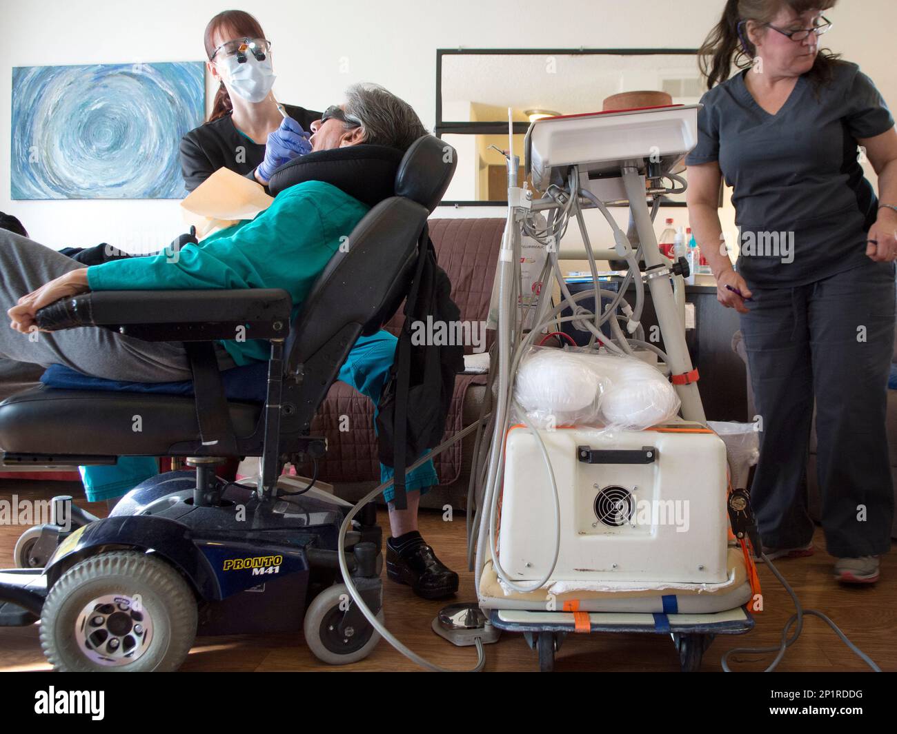 Jenna Mayerhofer, left, a dental hygienist for Dental Care In Your Home