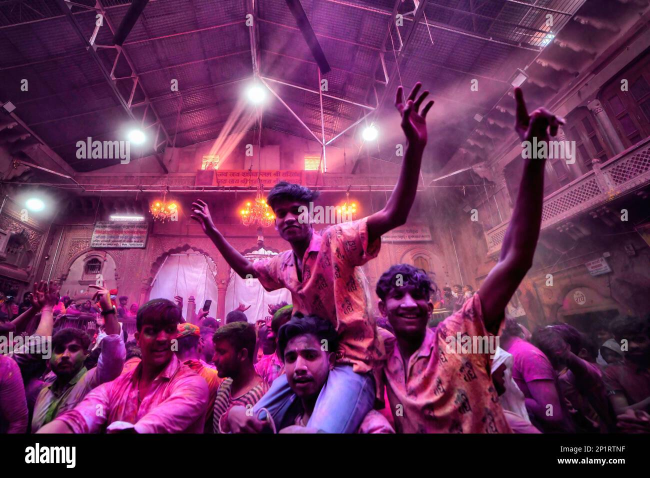 Vrindavan, India. 03rd Mar, 2023. Hindu devotees celebrate Holi at Radha Ballav Temple with colorful powders (Gulal). Radha Ballav Temple is one of the auspicious temple for the Hindu where Lord Krishna is being worshipped especially during the Holi Festival. Credit: SOPA Images Limited/Alamy Live News Stock Photo