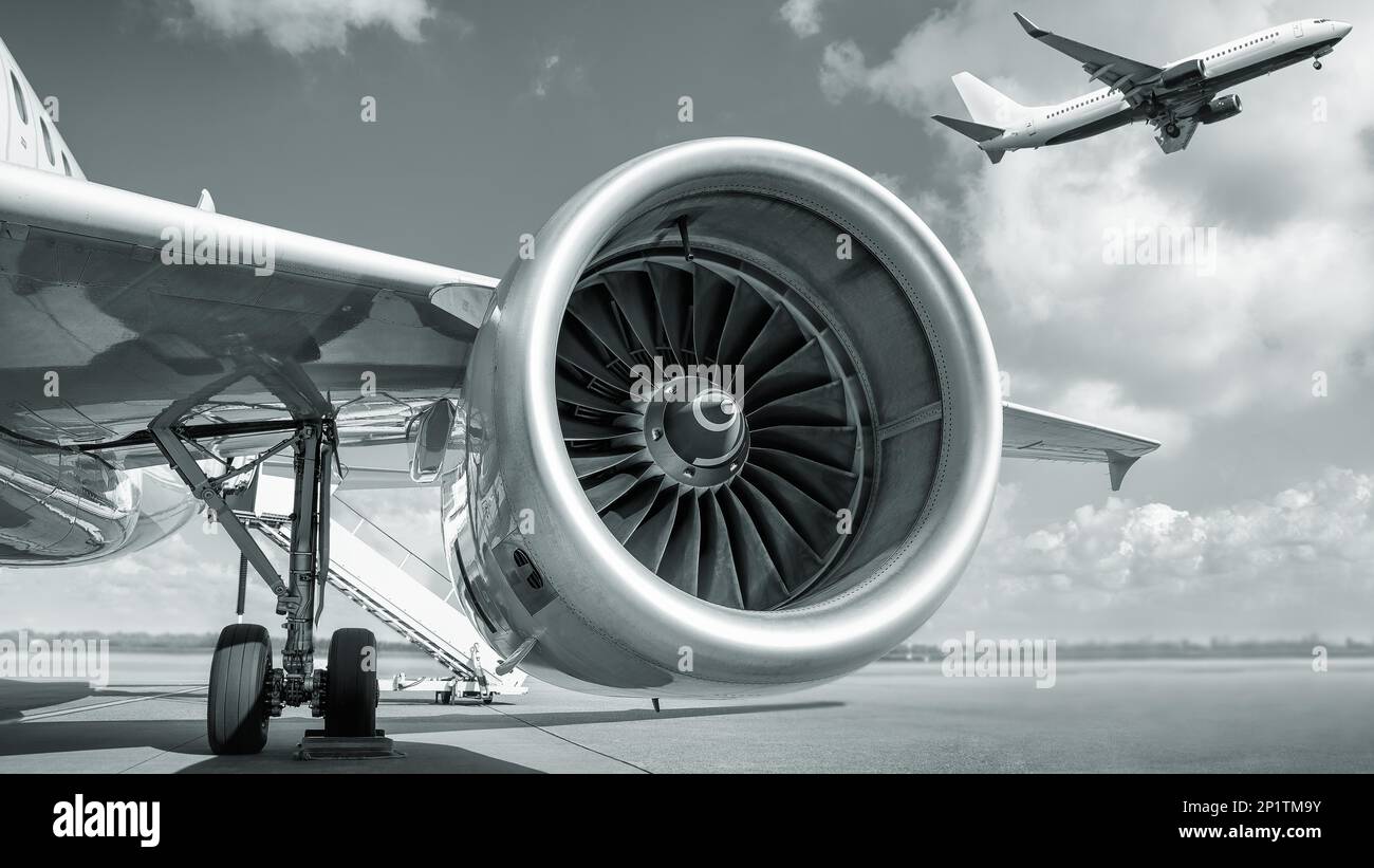 jet engine and a starting airplane in the back Stock Photo Alamy