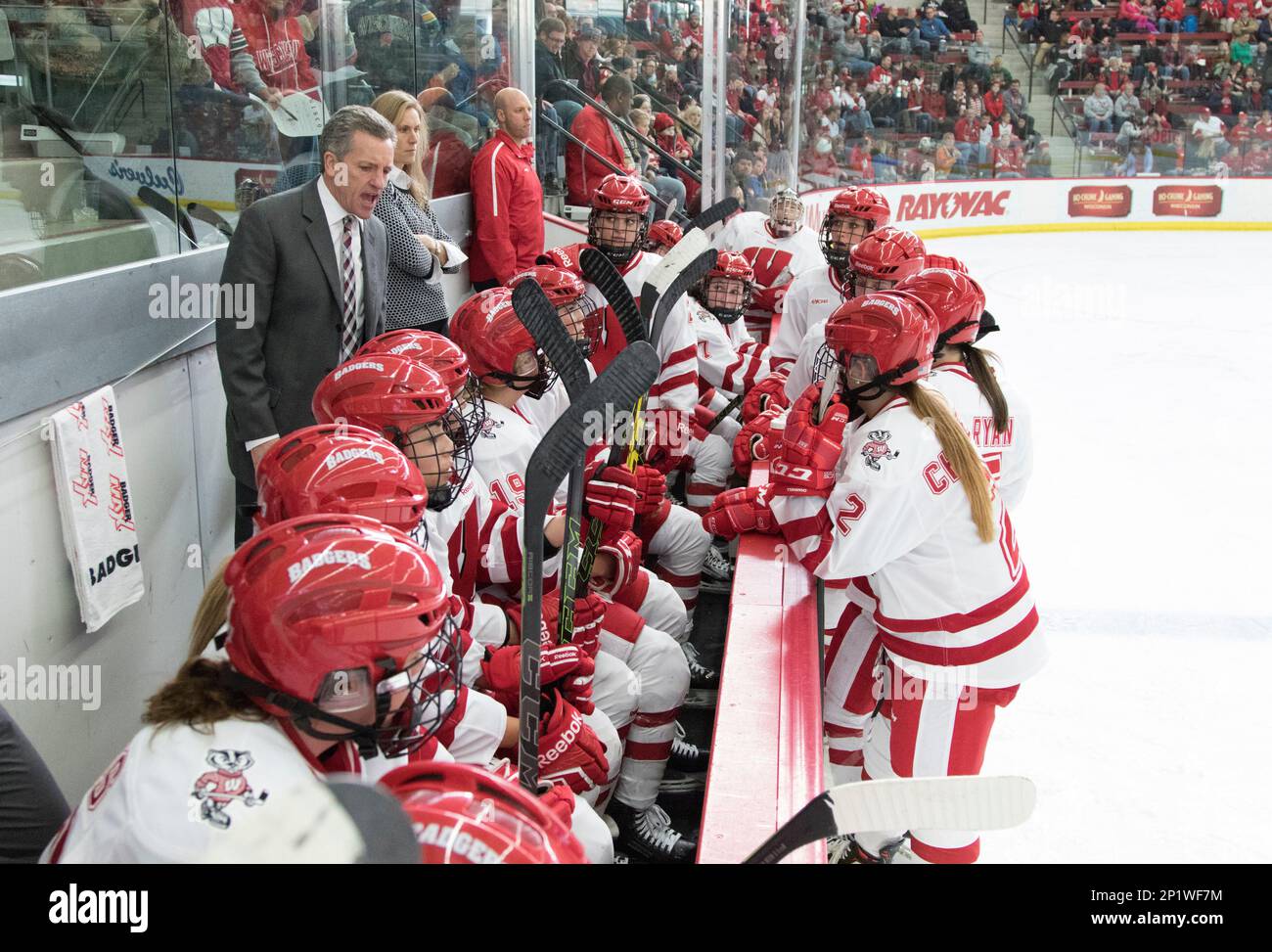 Wisconsin Badgers Head Coach Mark Johnson talks to his players during