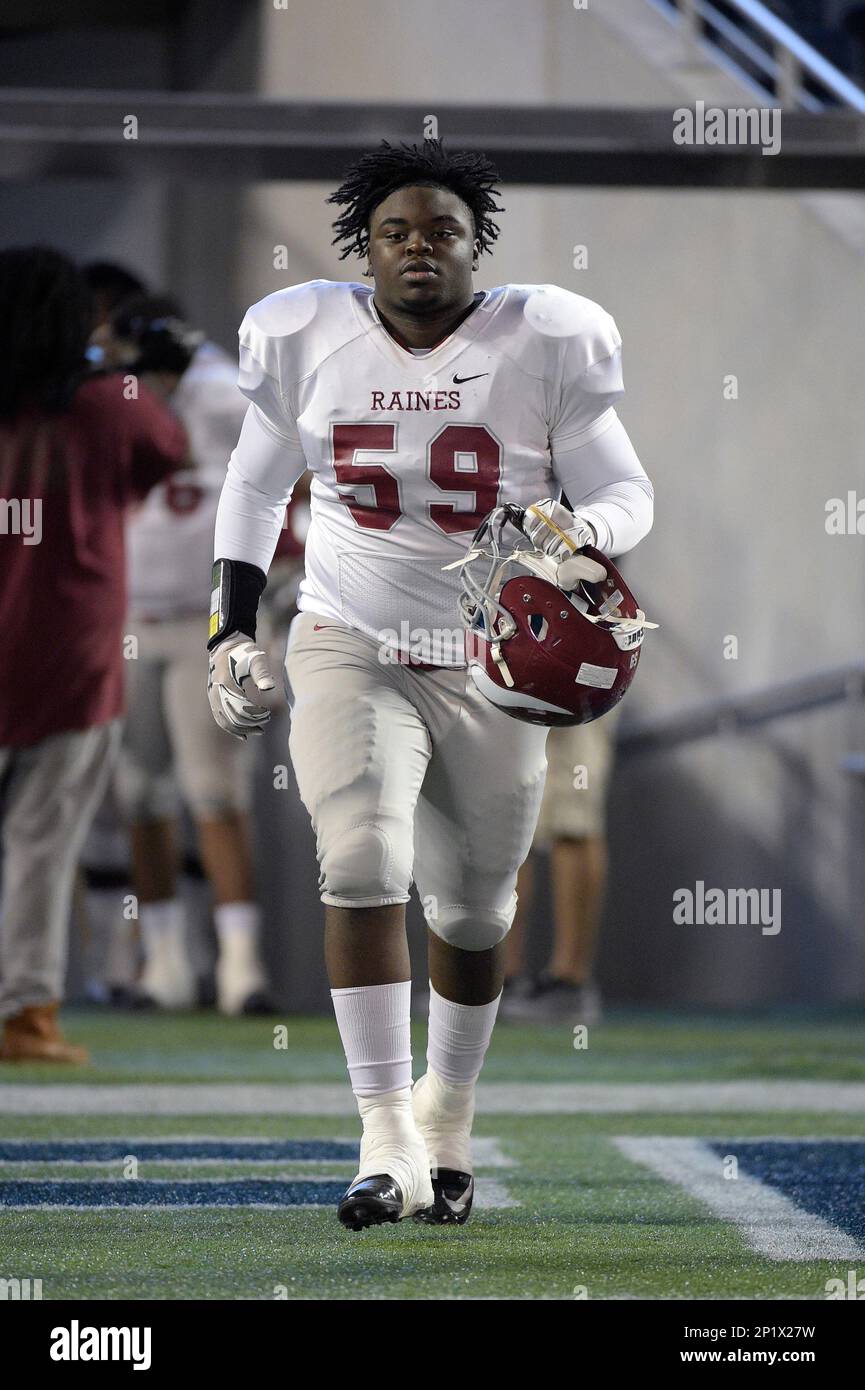 Raines Offensive Lineman Terrion Williams (59) Runs Onto The Field ...