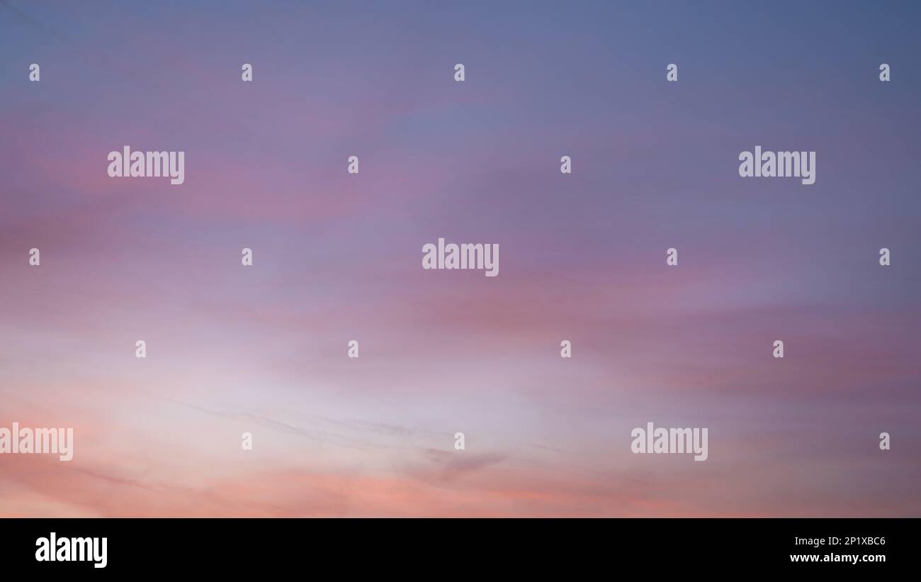 Evening sky with pastel-colored clouds Stock Photo