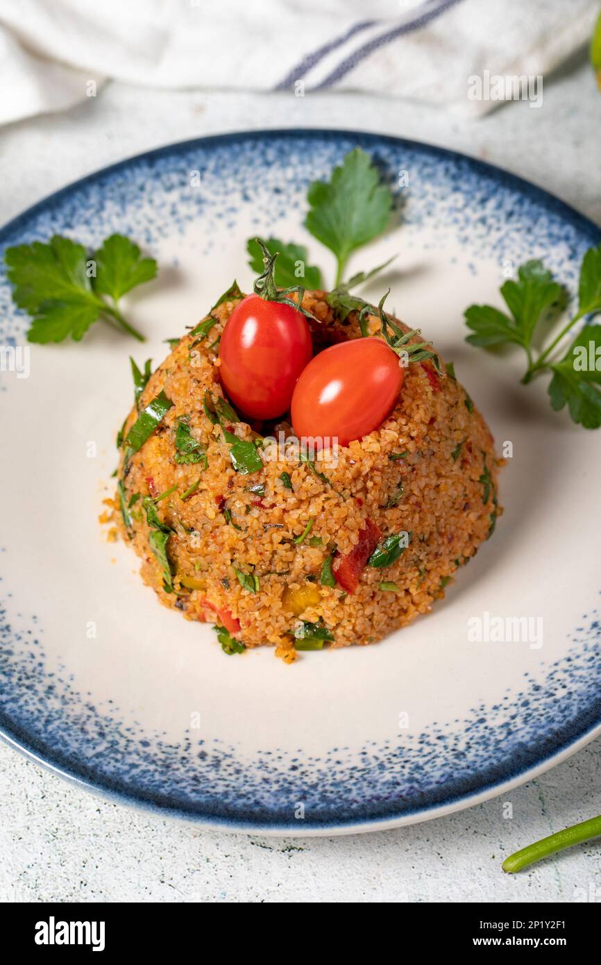 Bulgur salad on gray background. Traditional Turkish Bulgur Salad or ...