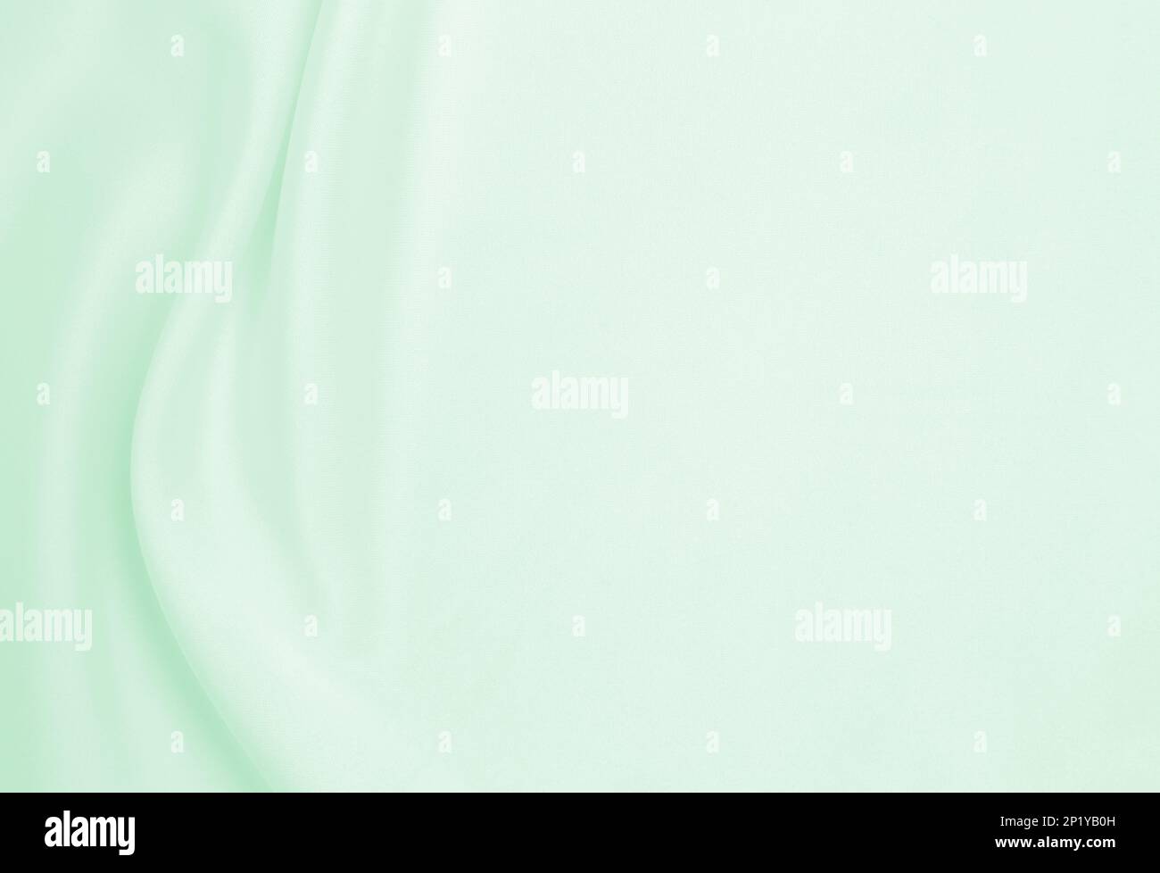 Smooth elegant green silk or satin luxury cloth texture can use as ...