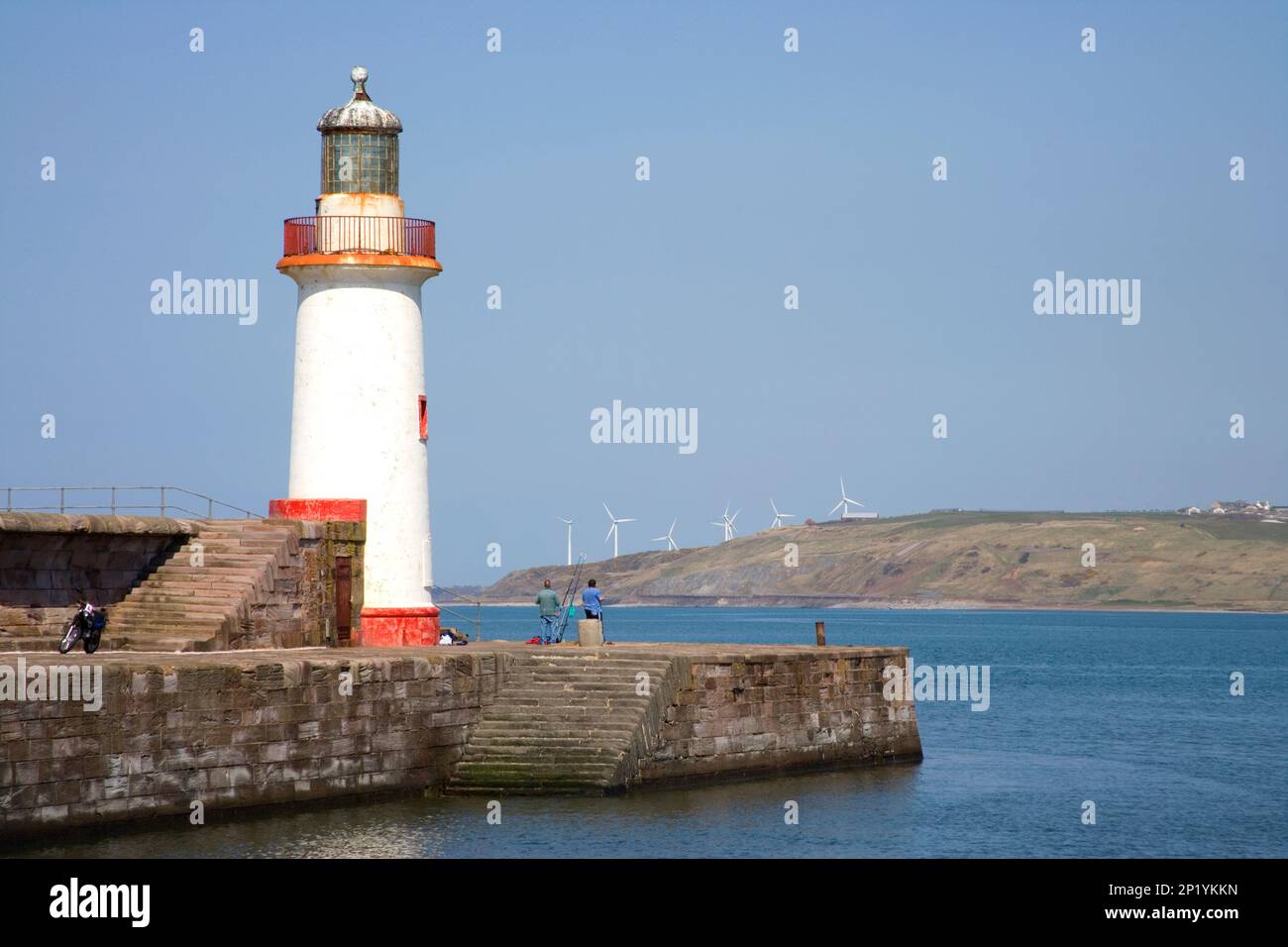 lighthouse at the entrance to whitehaven harbour cumbria england uk Stock Photo