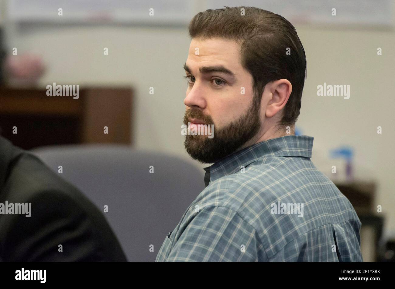 In this Dec. 9, 2015 photo, Daniel Wozniak sits in court as opening