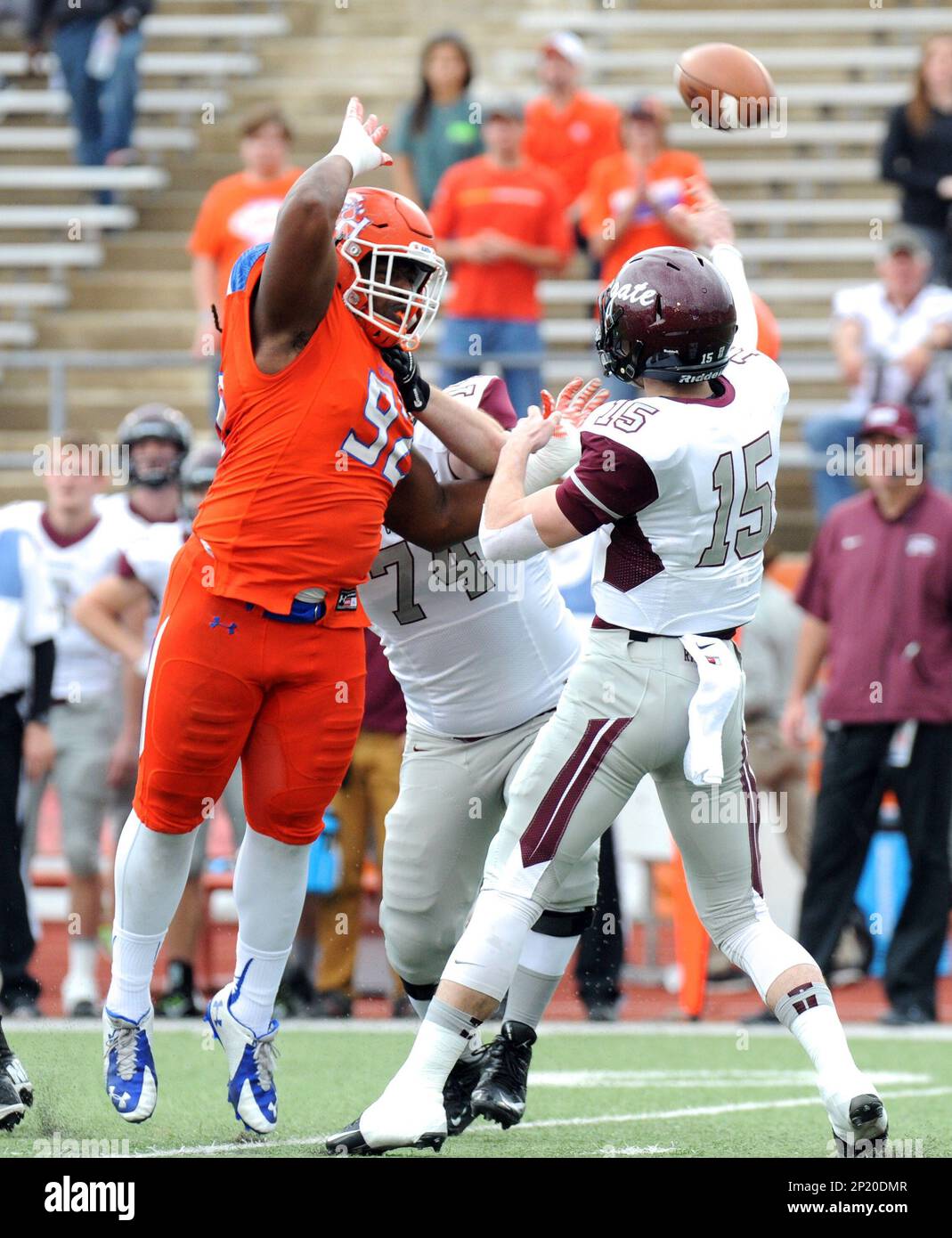 Colgate quarterback Jake Melville (15) throws under pressure from Sam