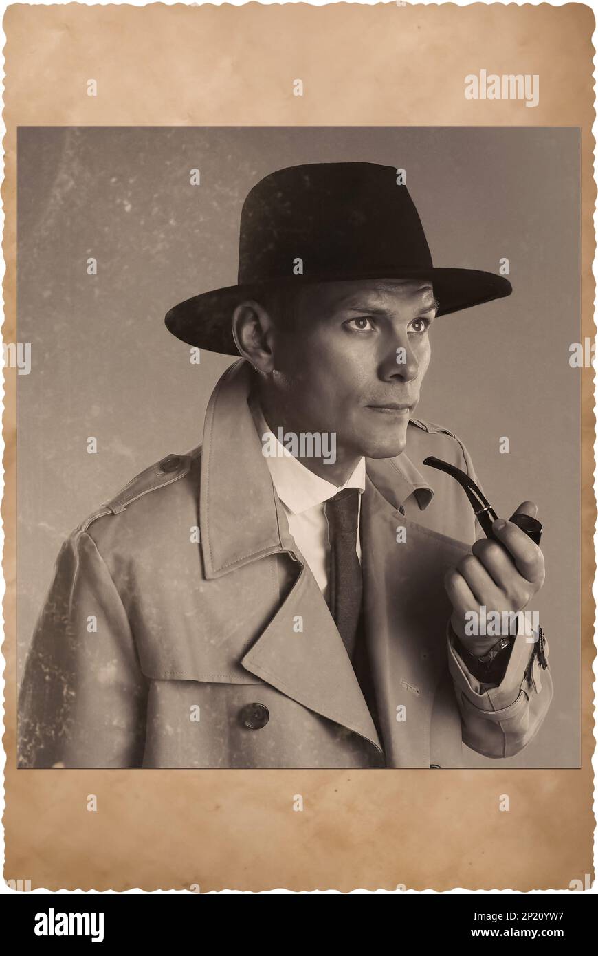 Old picture of handsome man with smoking pipe. Portrait for family tree Stock Photo