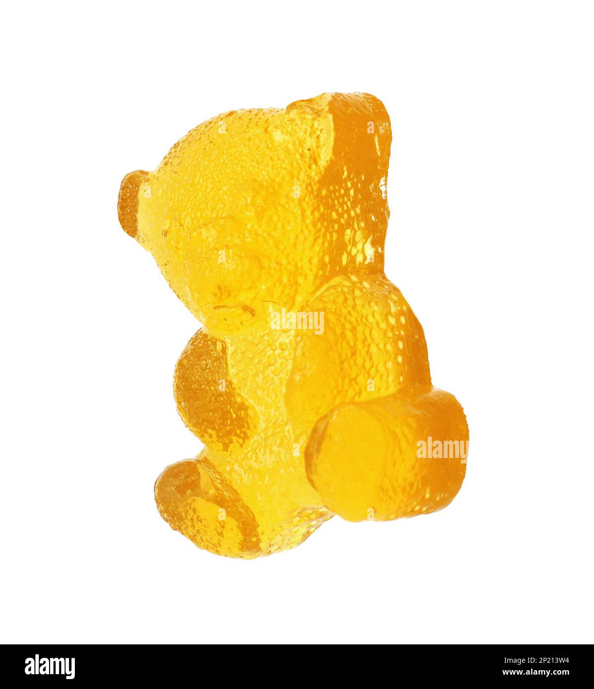 Delicious yellow gummy bear candy isolated on white Stock Photo
