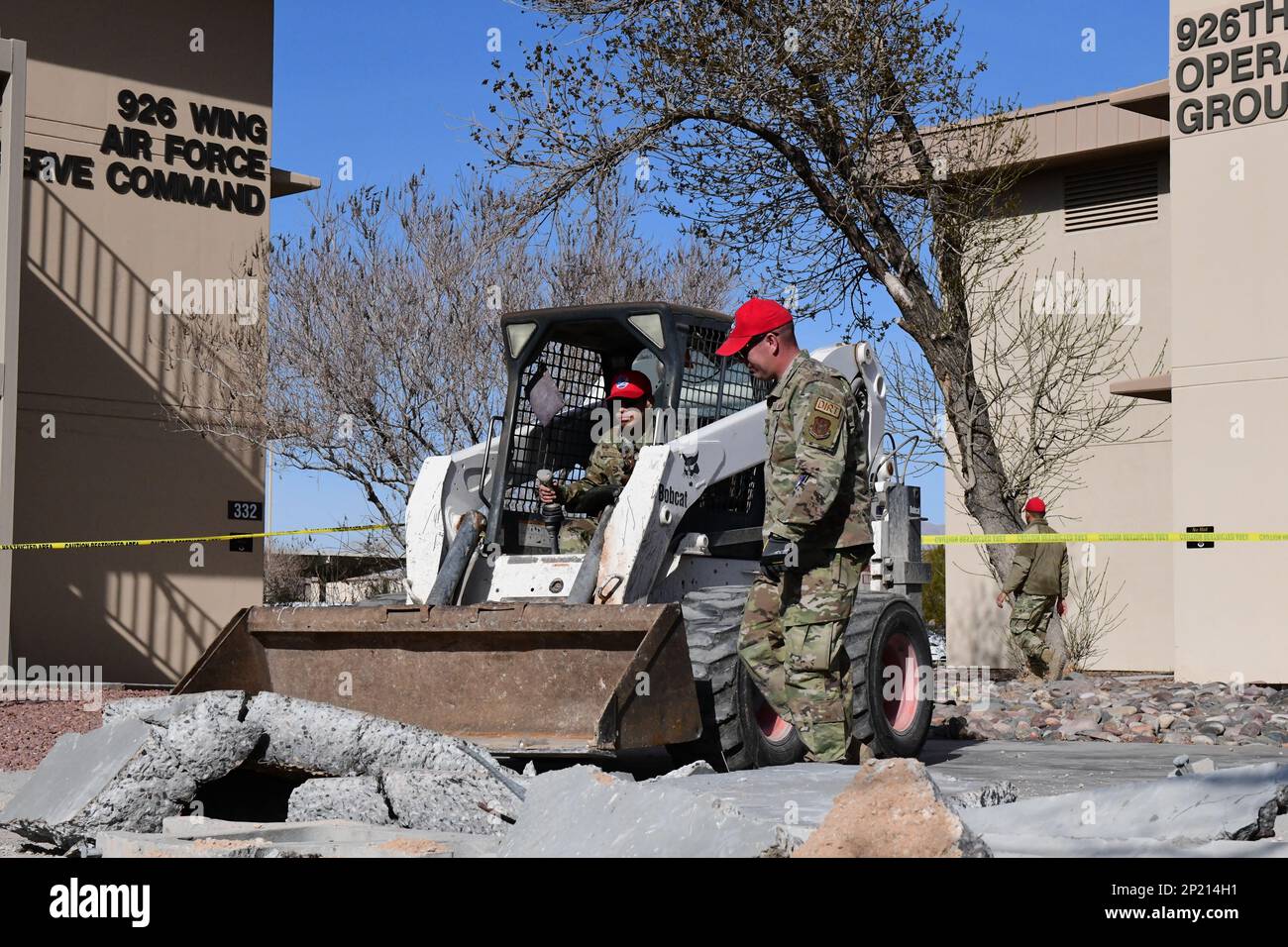 Members of the 555th Red Horse Squadron demolish the 926th Wing ...