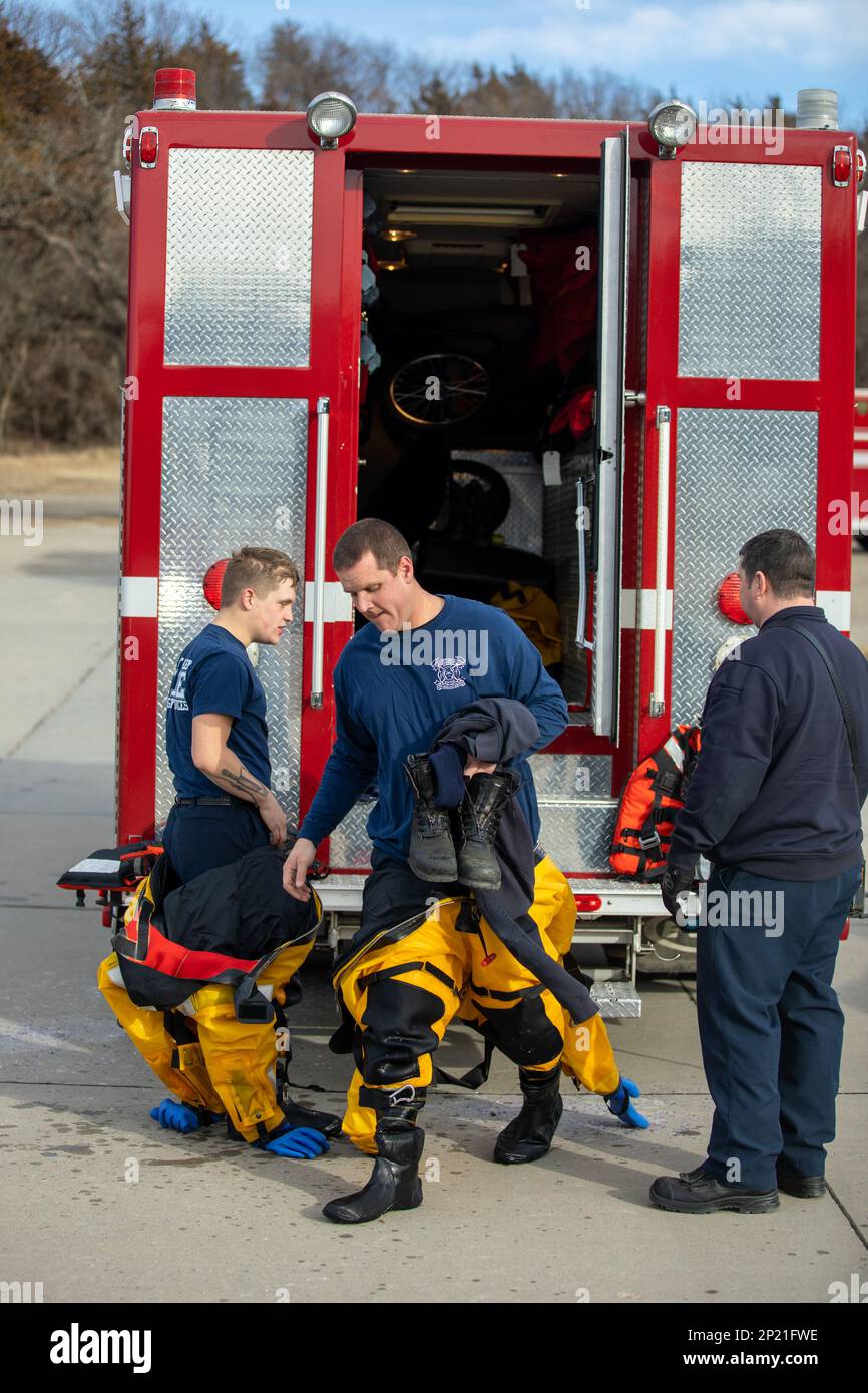 The Fort Riley Fire Department and Emergency Services firefighters gather equipment and prepare for an ice rescue training exercise at Moon Lake on Fort Riley, Kansas, Feb. 1, 2023. Stock Photo