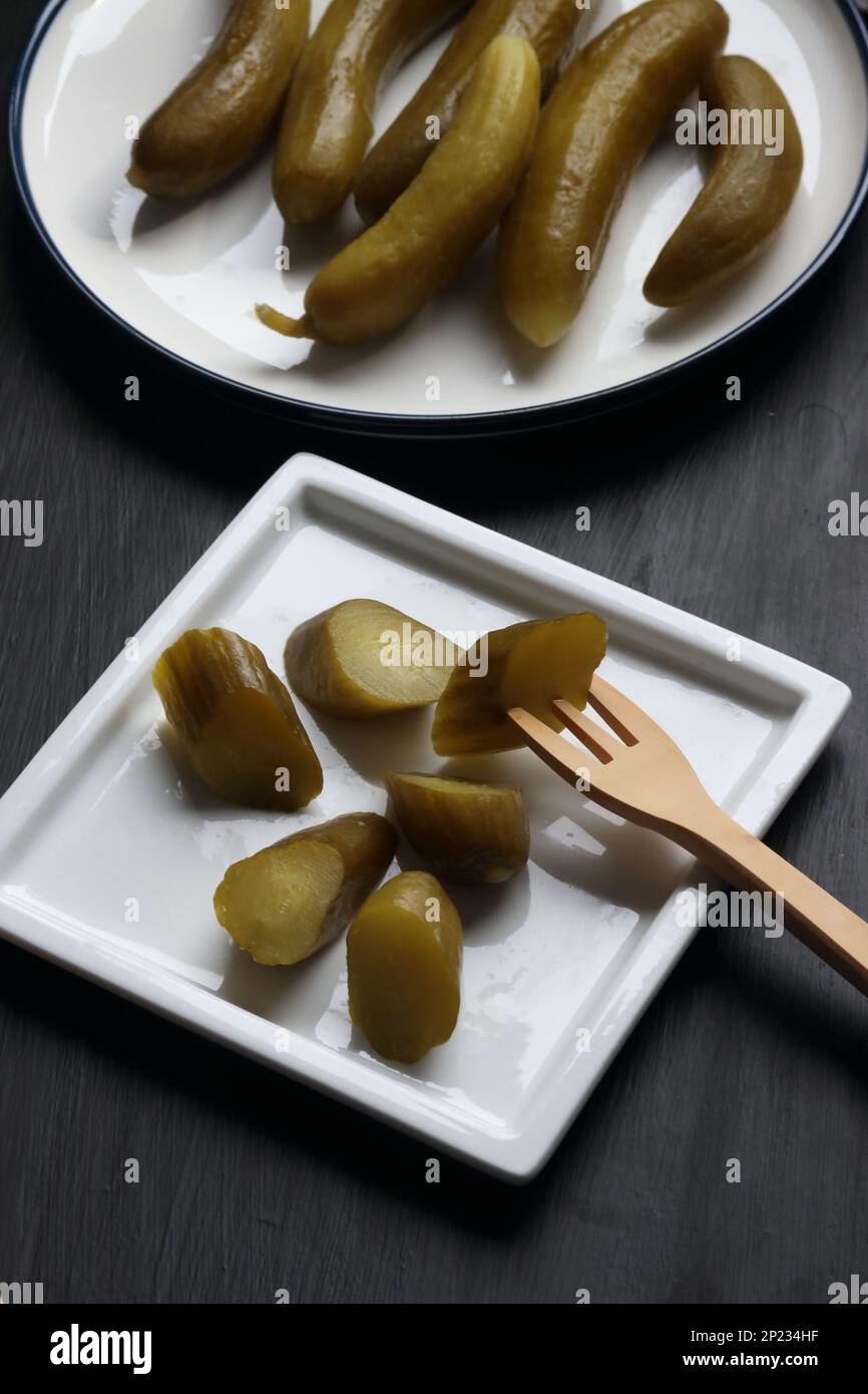 Cucumber pickles on a black background Stock Photo