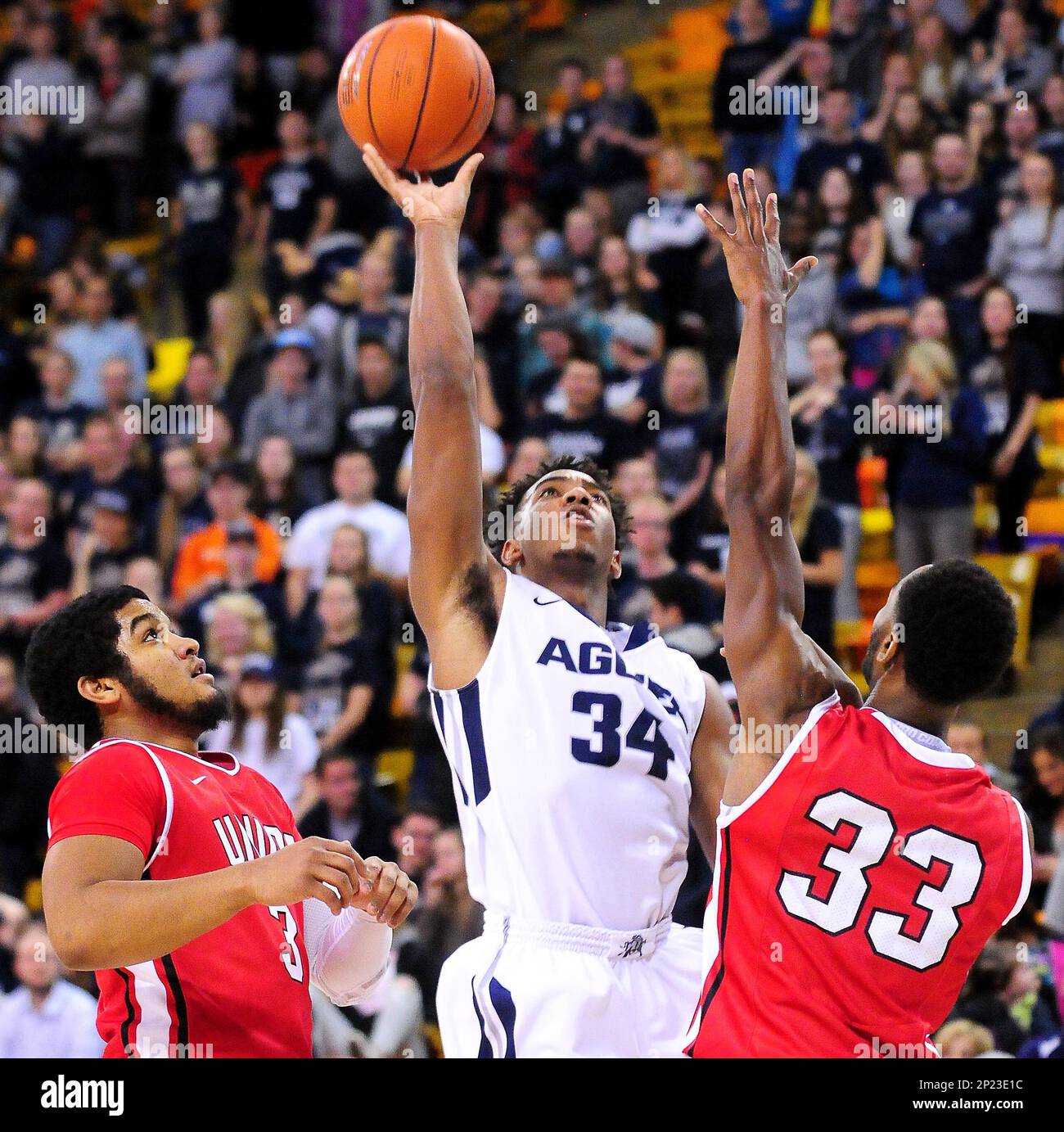 Utah State s Chris Smith center goes up for a layup while