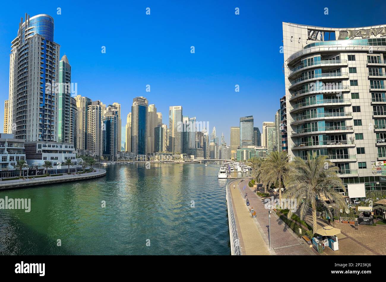 Dubai Marina, Harbour, Cruise Boat And Canal Promenade View At Sunset ...