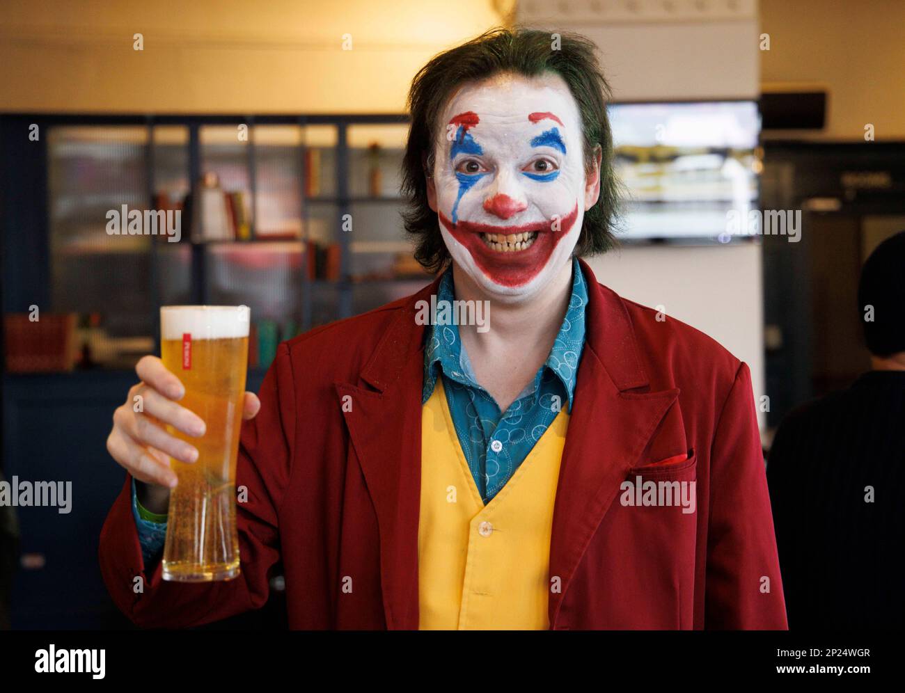 London, UK. 4th Mar, 2023. A man dressed as The Joker in a local pub. People dress as their favourite characters of Film and TV at the Spring Comic Con at Londons Olympia Credit: Mark Thomas/Alamy Live News Stock Photo