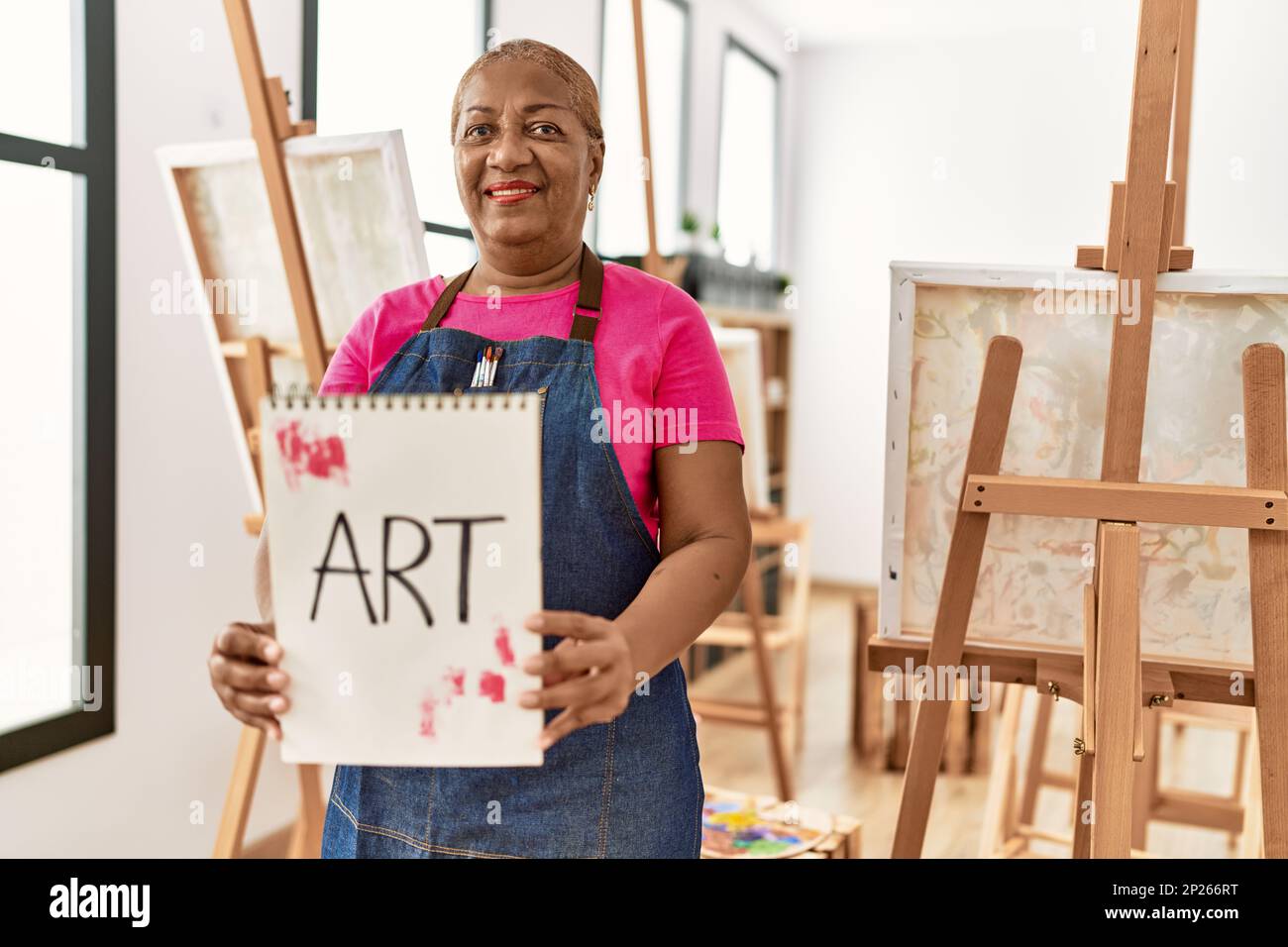 Senior learning painting african hi-res stock photography and images ...
