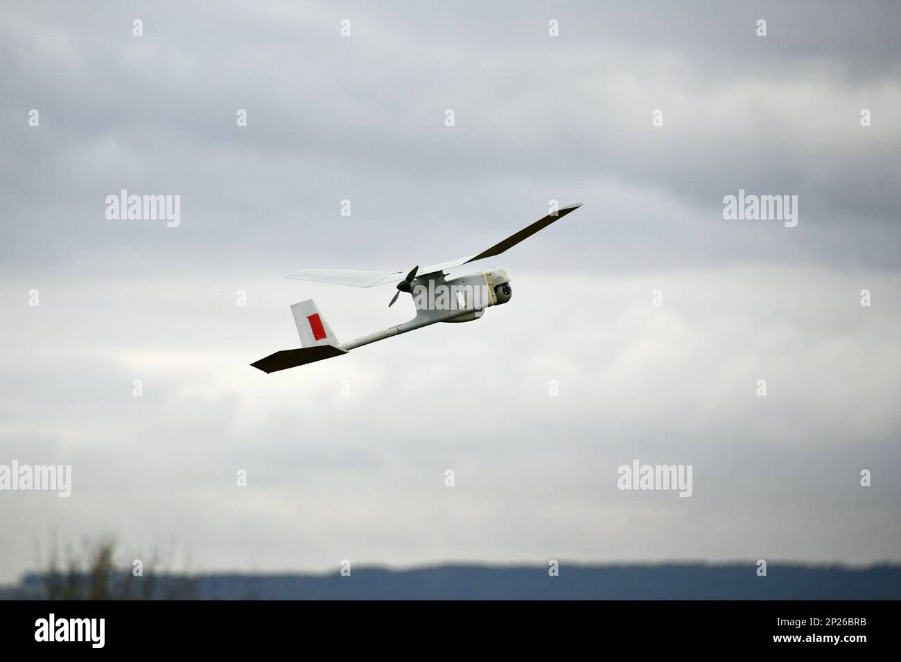 U.S. Soldiers with Palehorse Troop, 4th Squadron, 2nd Cavalry Regiment conduct training with an RQ-11 Raven, a Small Unmanned Aircraft System, at the 7th Army Training Command’s Grafenwoehr Training Area, Germany, Jan. 10, 2023. 2CR provides V Corps with a lethal and agile force capable of rapid deployment throughout the European theater in order to assure allies, deter adversaries, and when ordered, defend the NATO alliance. Stock Photo