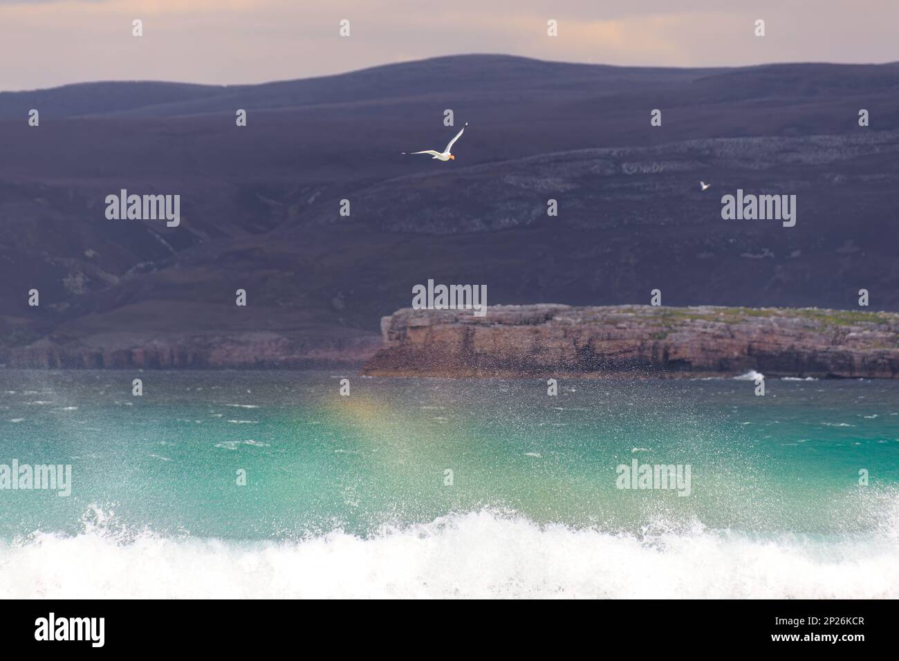 The beautiful sandy beaches awith awesome clouds and turquoise water in Scotland Stock Photo