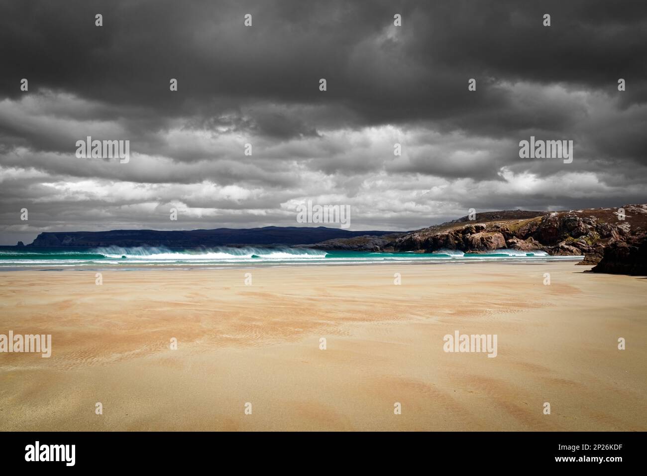 The beautiful sandy beaches awith awesome clouds and turquoise water in Scotland Stock Photo