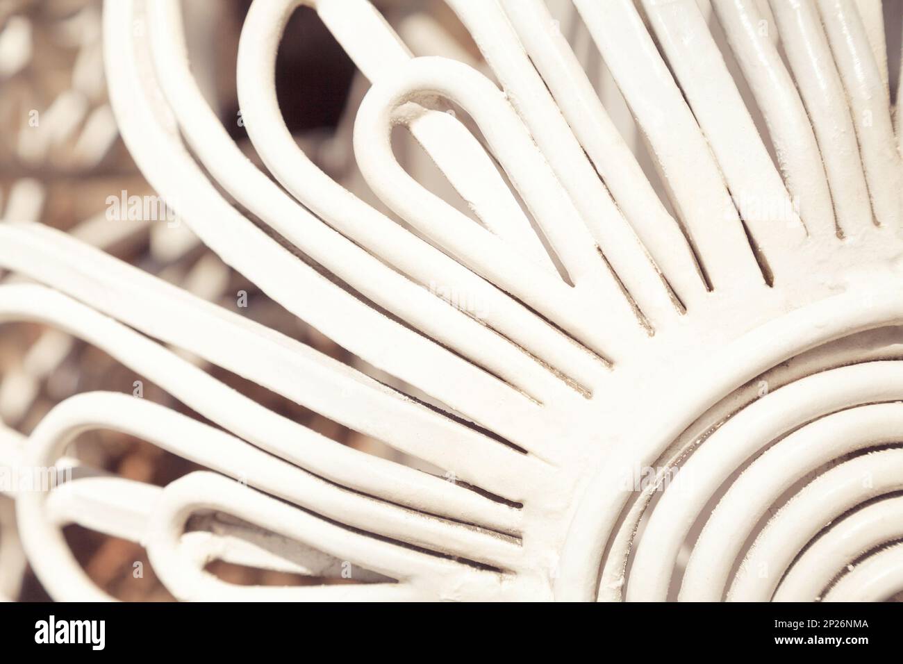 White curved metal rods background. Floral pattern abstract backdrop