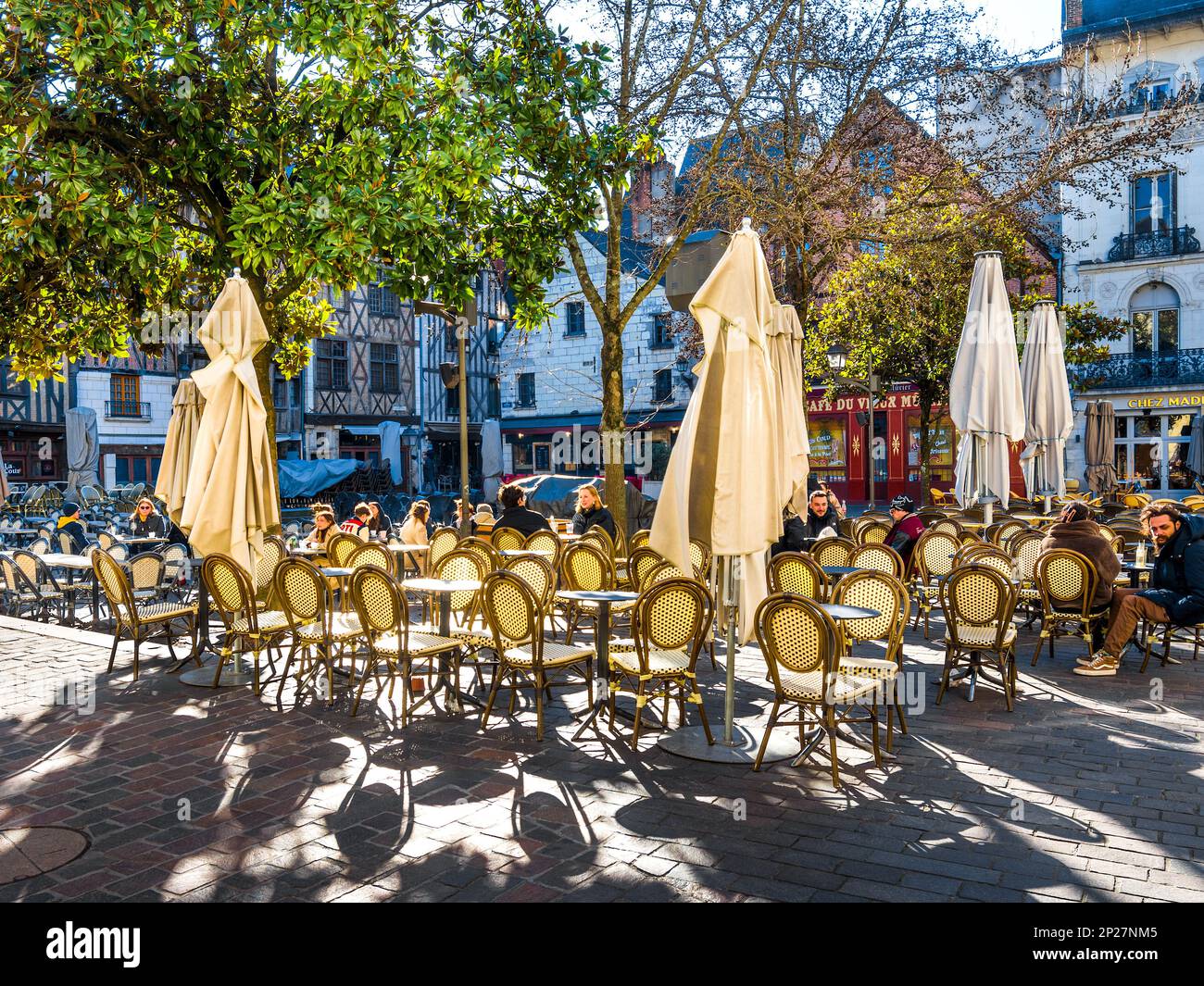 People enjoying morning coffee in the Place Plumereau, Tours, Indre-et-Loire (37), France. Stock Photo