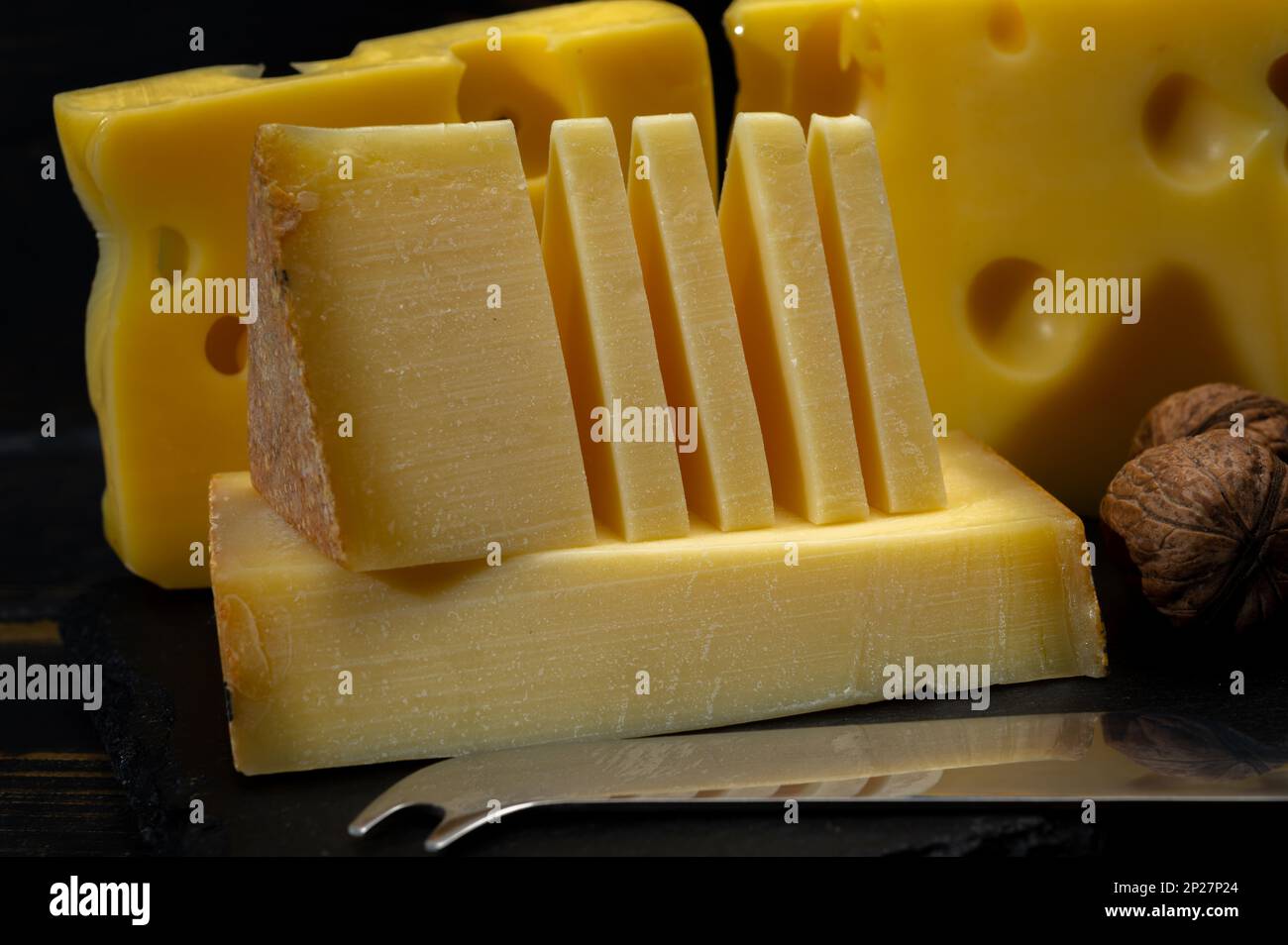 Assortment of Swiss cheeses Emmental or Emmentaler mediumhard cheese
