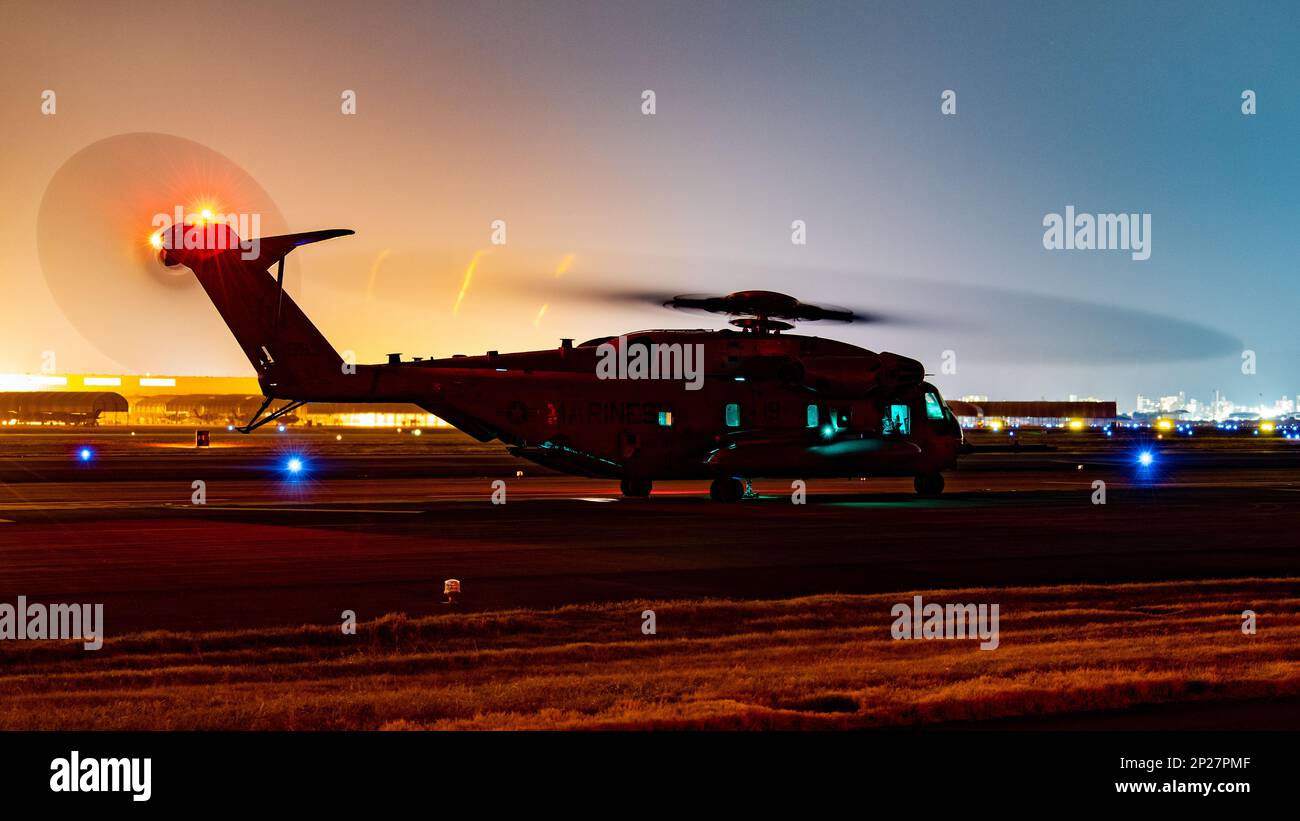 A U.S. Marine Corps CH-53E Super Stallion with Marine Medium Tiltrotor Squadron 262 (Reinforced), 31st Marine Expeditionary Unit (MEU), prepares to airlift cargo during a helicopter support team (HST) exercise at Marine Corps Air Station Iwakuni, Japan, Feb. 19, 2023. The HST exercise was conducted to certify pilots in sling load operations and improve tactical proficiency. The 31st MEU, the Marine Corps’ only continuously forward-deployed MEU, provides a flexible and lethal force ready to perform a wide range of military operations as the premiere crisis response force in the Indo-Pacific reg Stock Photo