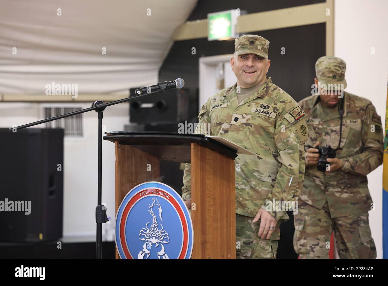 At Camp Buehring, Area Support Group - Kuwait holds a Change of Responsibility Ceremony for the transition of the base support battalion's senior non-commissioned officer. Incoming Command Sgt. Maj. Ruben F. Borja replaces outgoing Command Sgt. Maj. Scott J. Lund as BSB NCOIC, January 13, 2023. Stock Photo