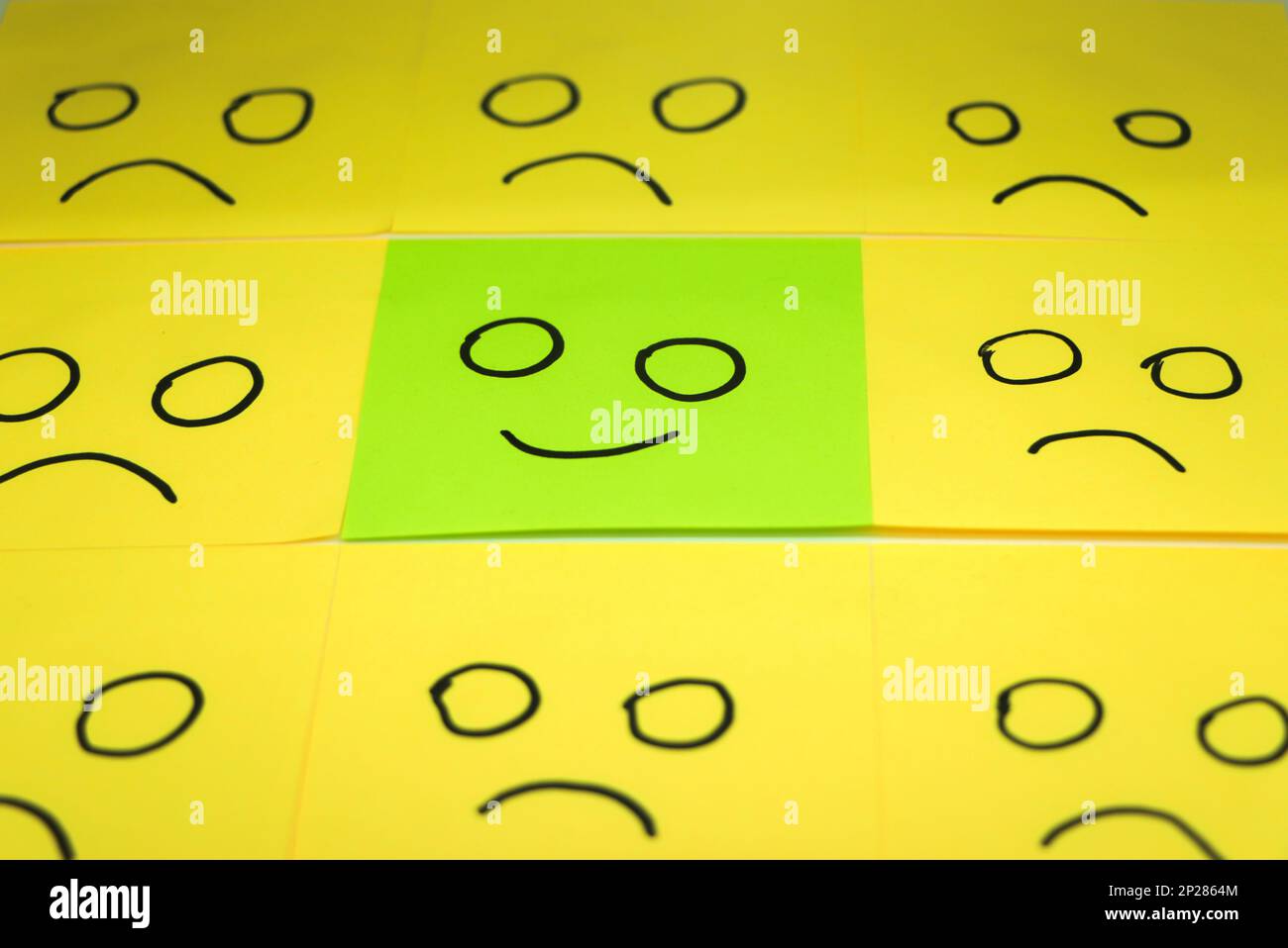 concept for a positive attitude with small office notes with multiple